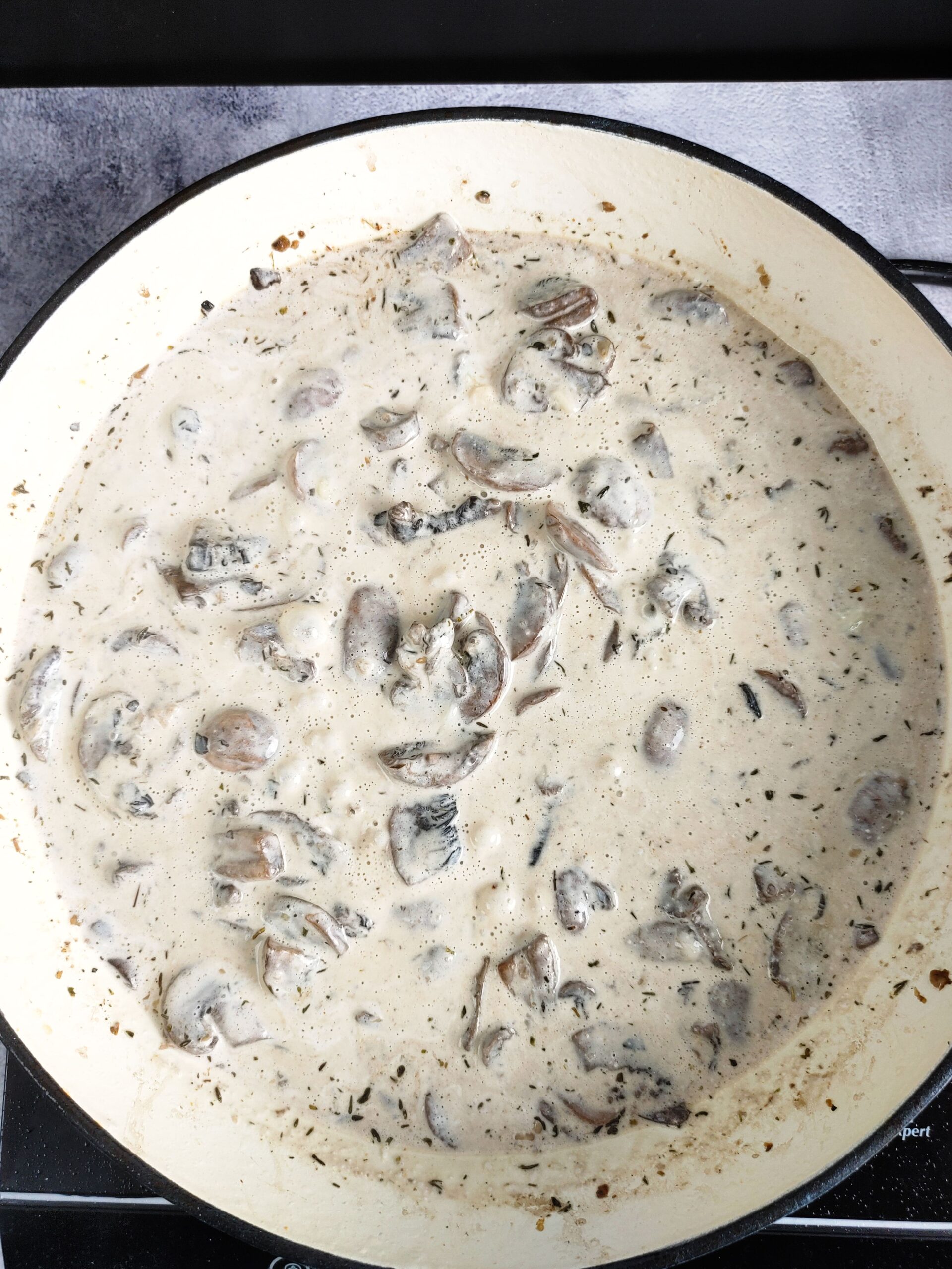 DEGLAZE THE PAN AND ADD HEAVY CREAM