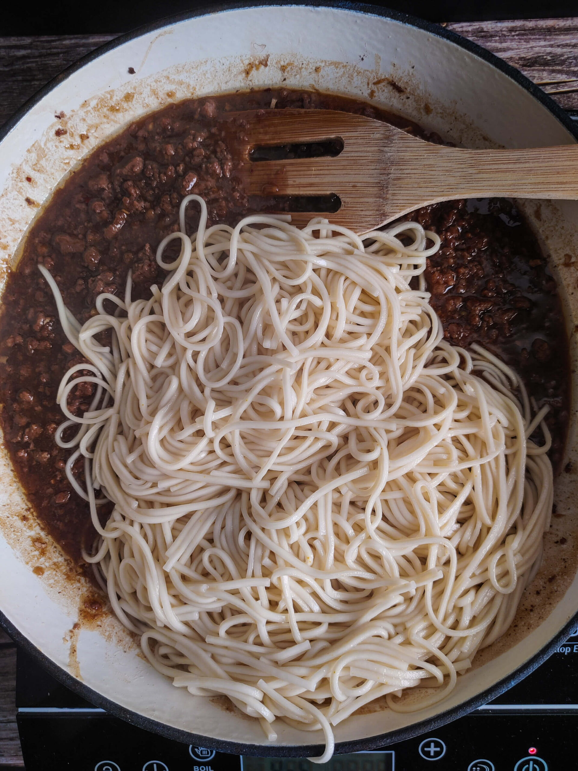 ADD THE COOKED NOODLES TO THE PAN
