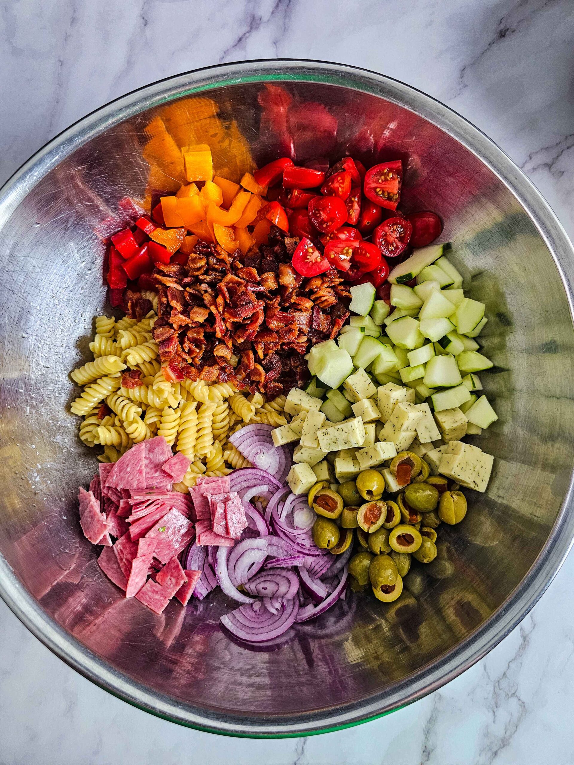 COMBINE PASTA SALAD INGREDIENTS