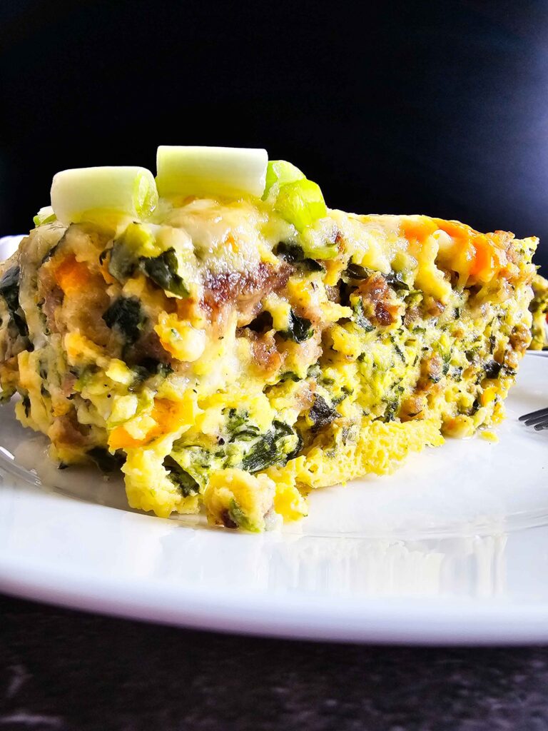 UP CLOSE SIDE VIEW OF THE BREAKFAST CASSEROLE