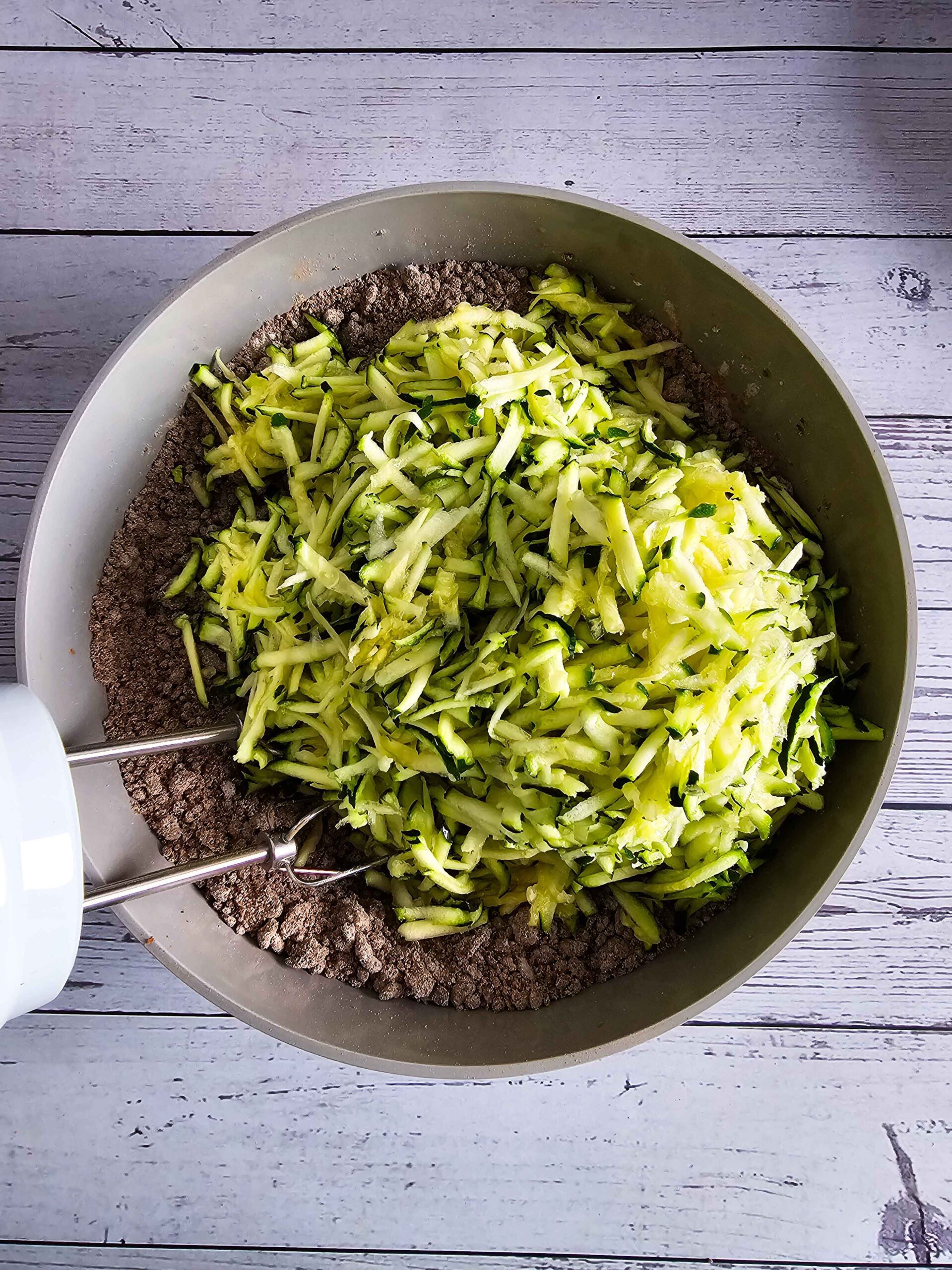 ADD THE ZUCCHINI TO THE BROWNIE BATTER