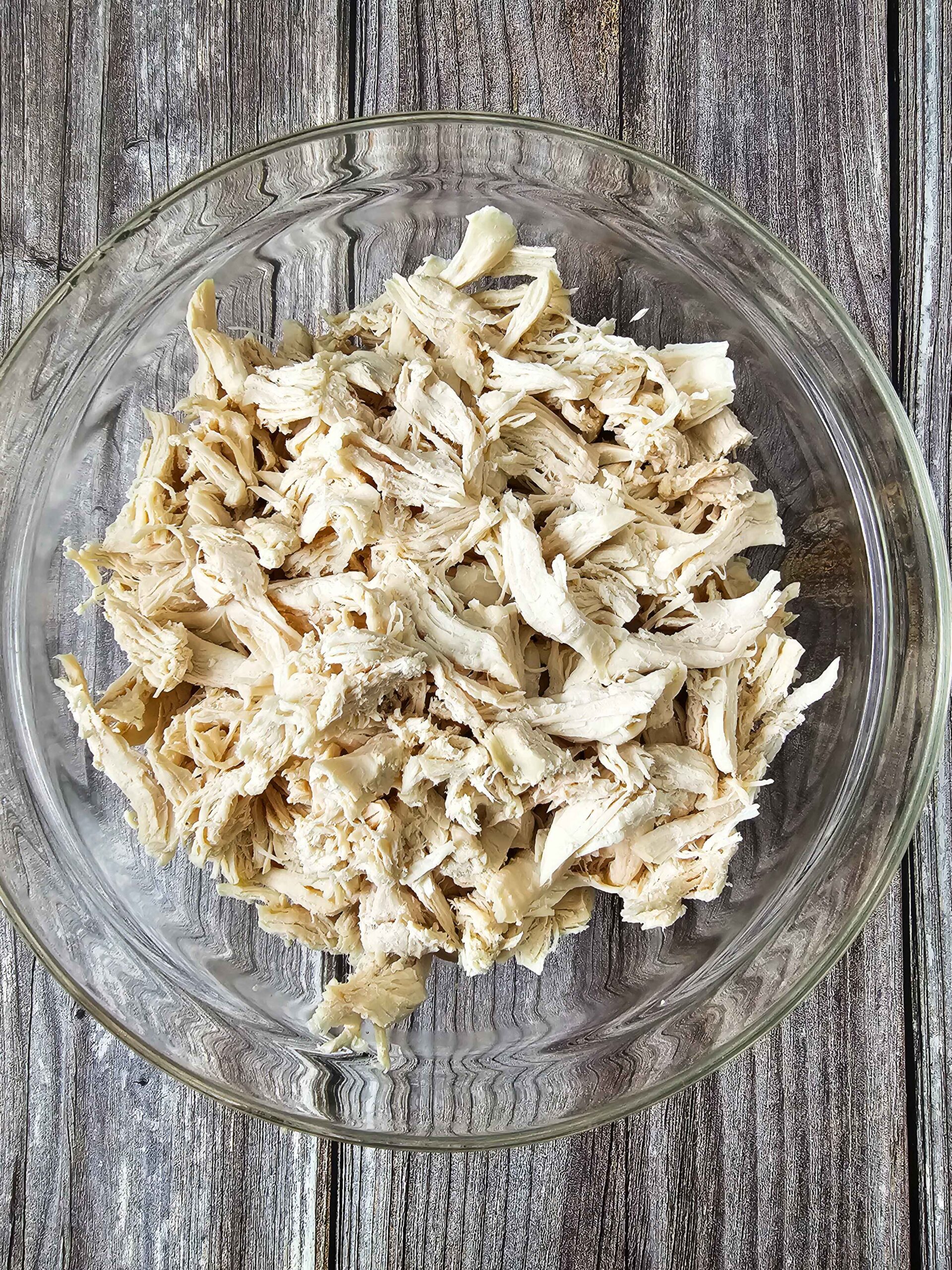 POACHED CHICKEN SHREDDED AND READY FOR BUAFFLO CHEESE SAUCE