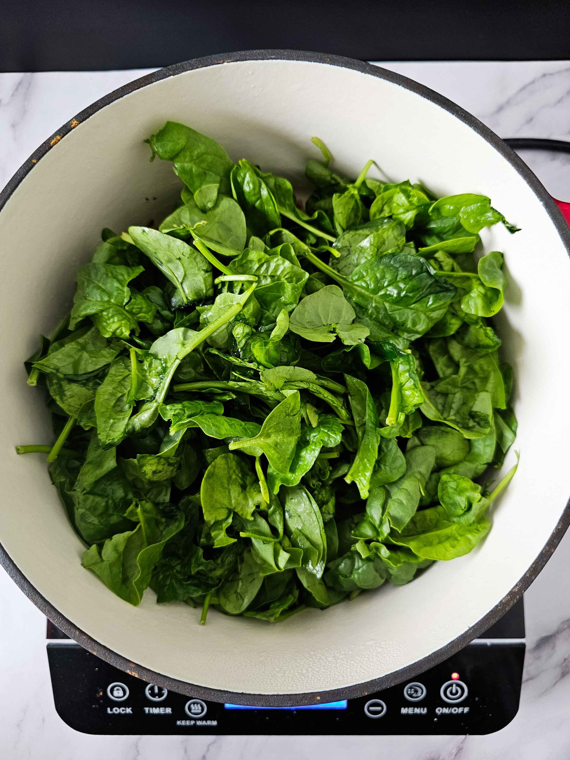 ADD SPINACH TO THE DUTCH OVEN