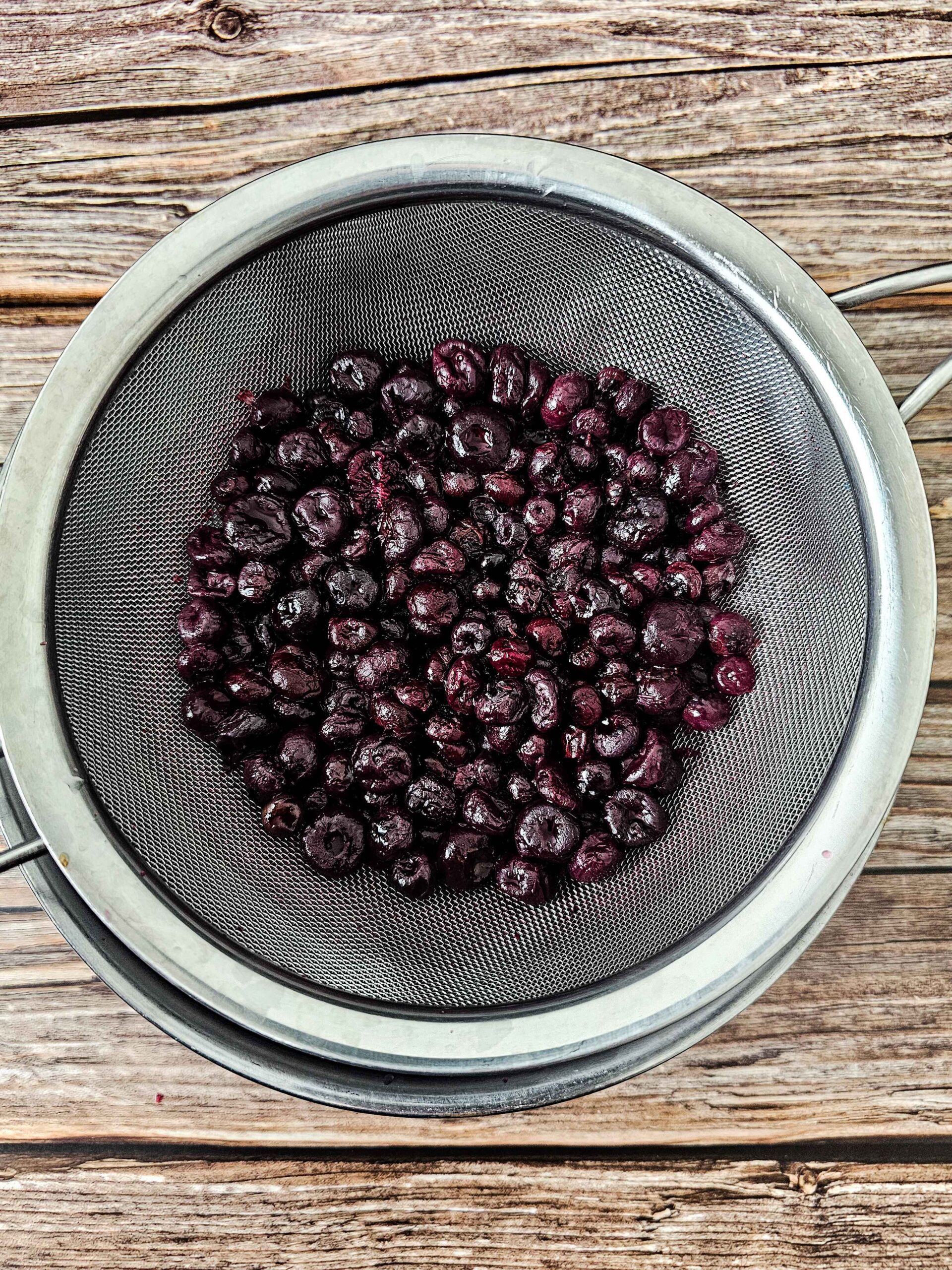 STRAIN THE BLUEBERRY PULP AND SAVE THE SYRUP