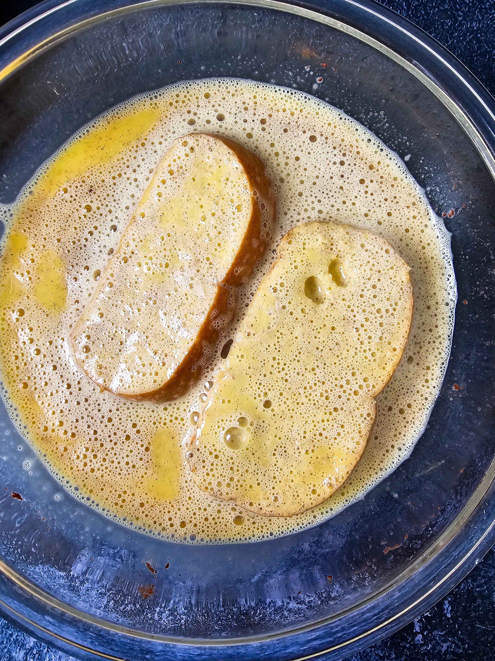 DIP BREAD INTO EGG MIXTURE