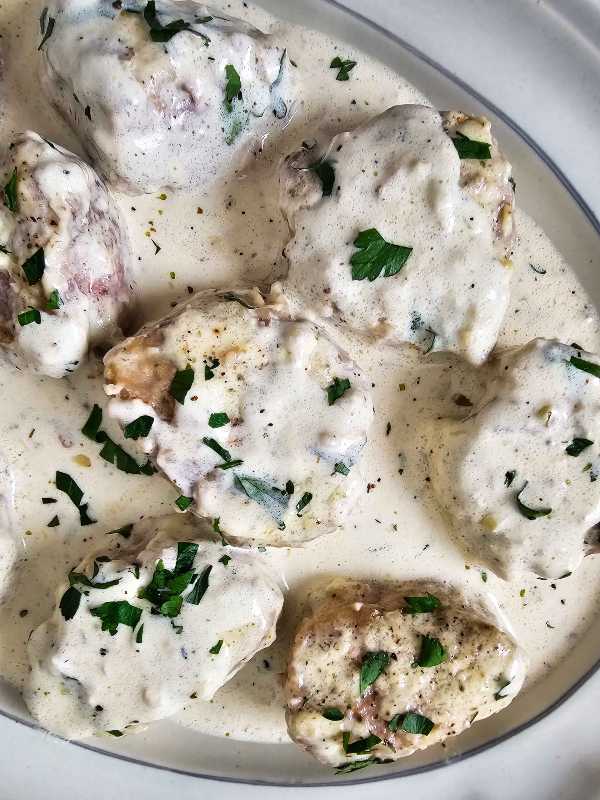 PORK TENDERLOIN MEDALLIONS IN CREAMY GARLIC HERB SAUCE