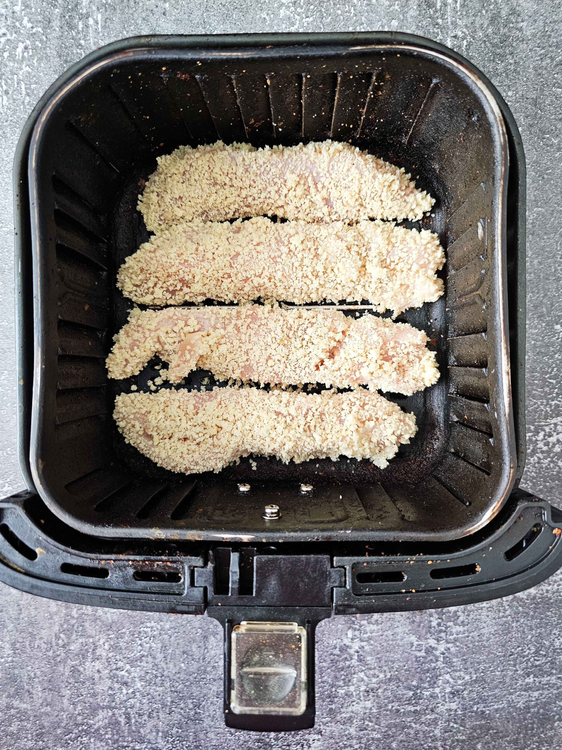 ADD BREADED TENDERS TO THE AIR FRYER BASKET