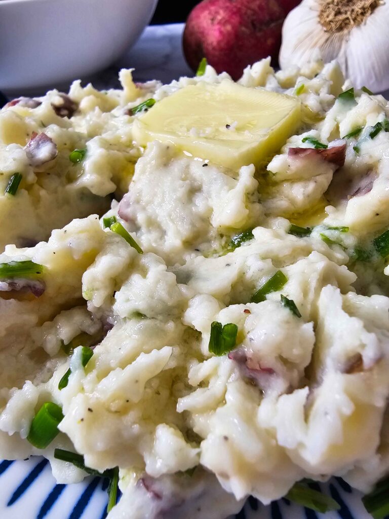 CREAMY GARLIC INFUSED RED POTATO MASH