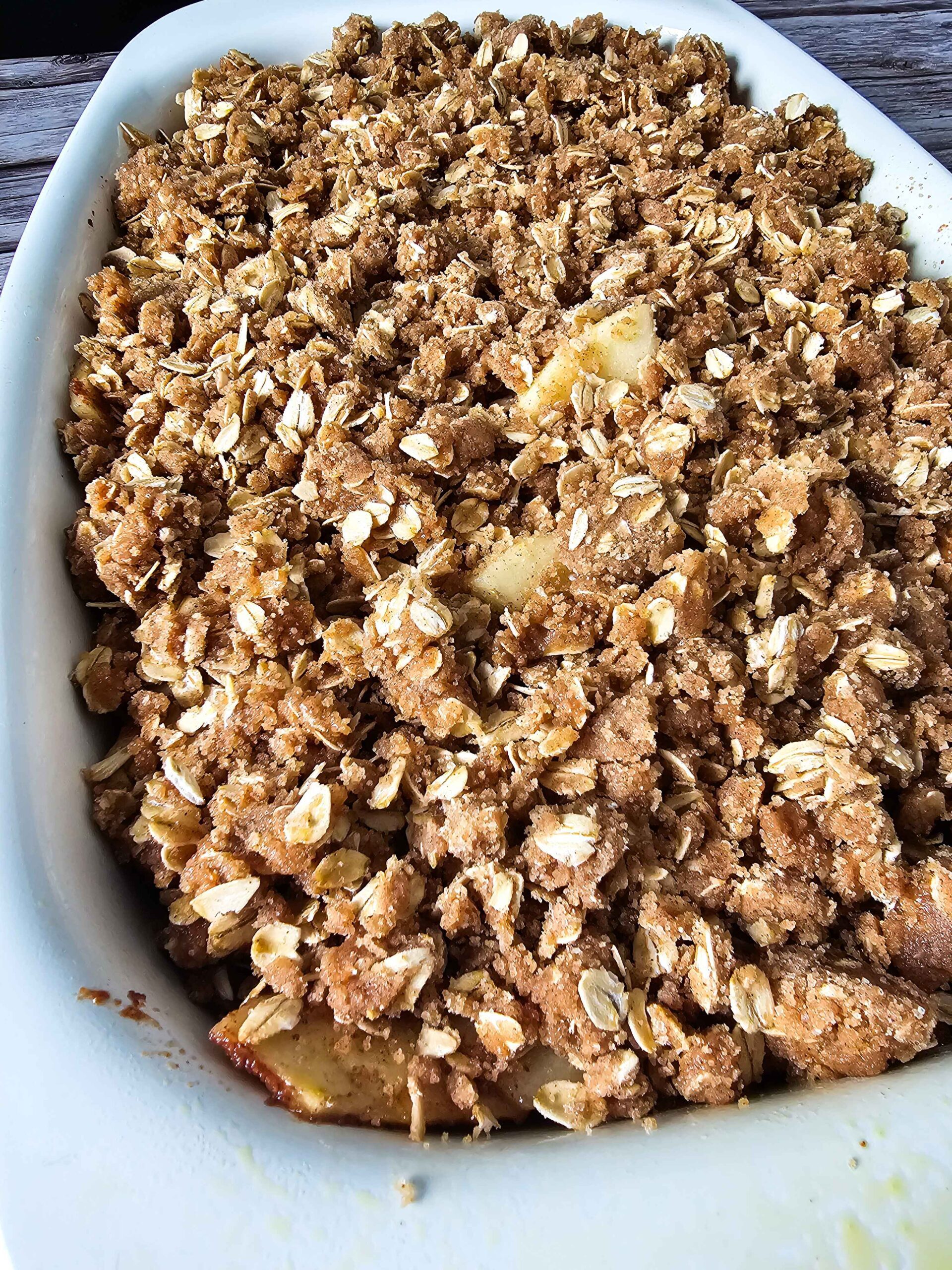 ADD THE CRUMB TOPPING TO THE APPLES -- COMBINE THE INGREDIENTS