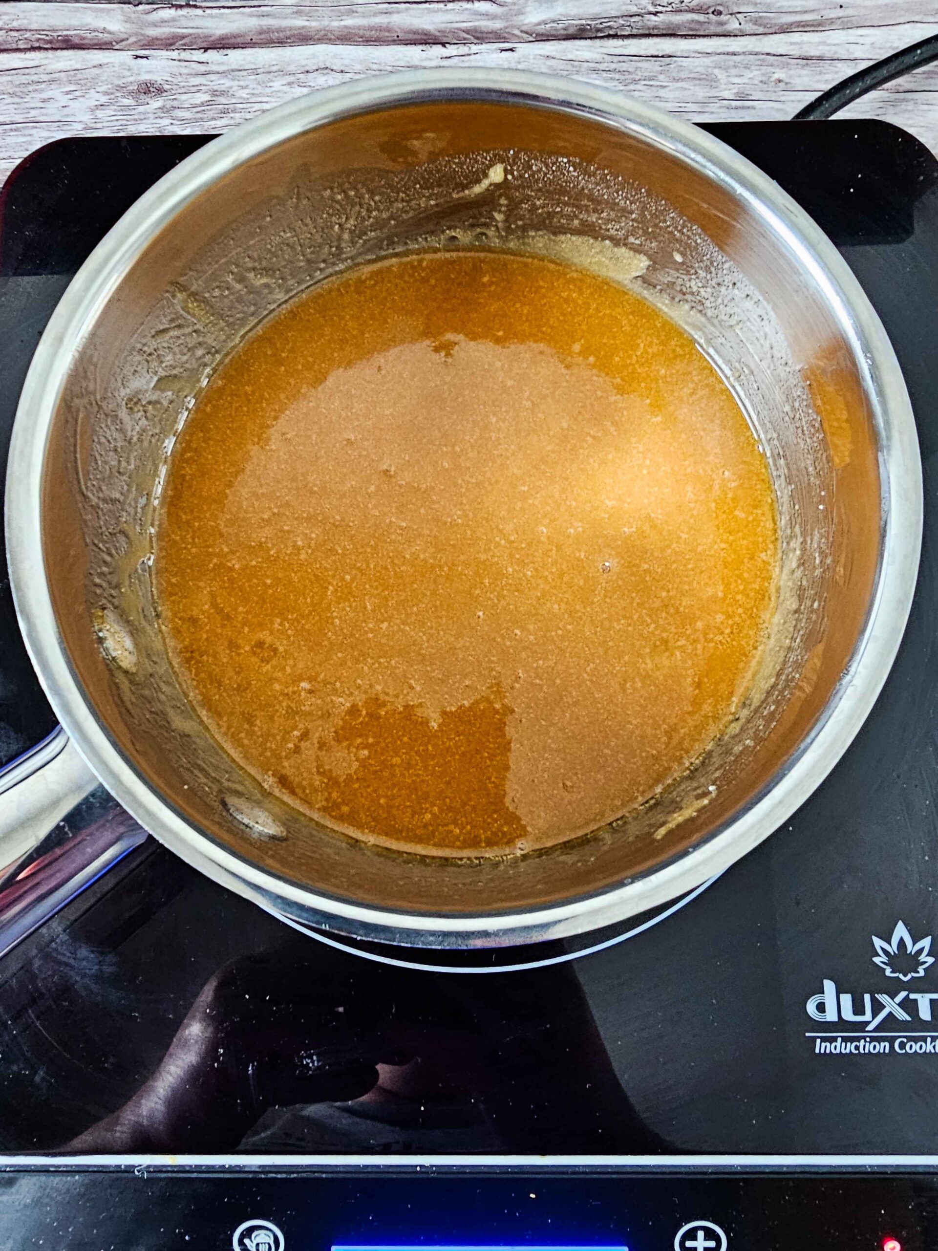 STIR THE CARAMEL GLAZE UNTIL SMOOTH