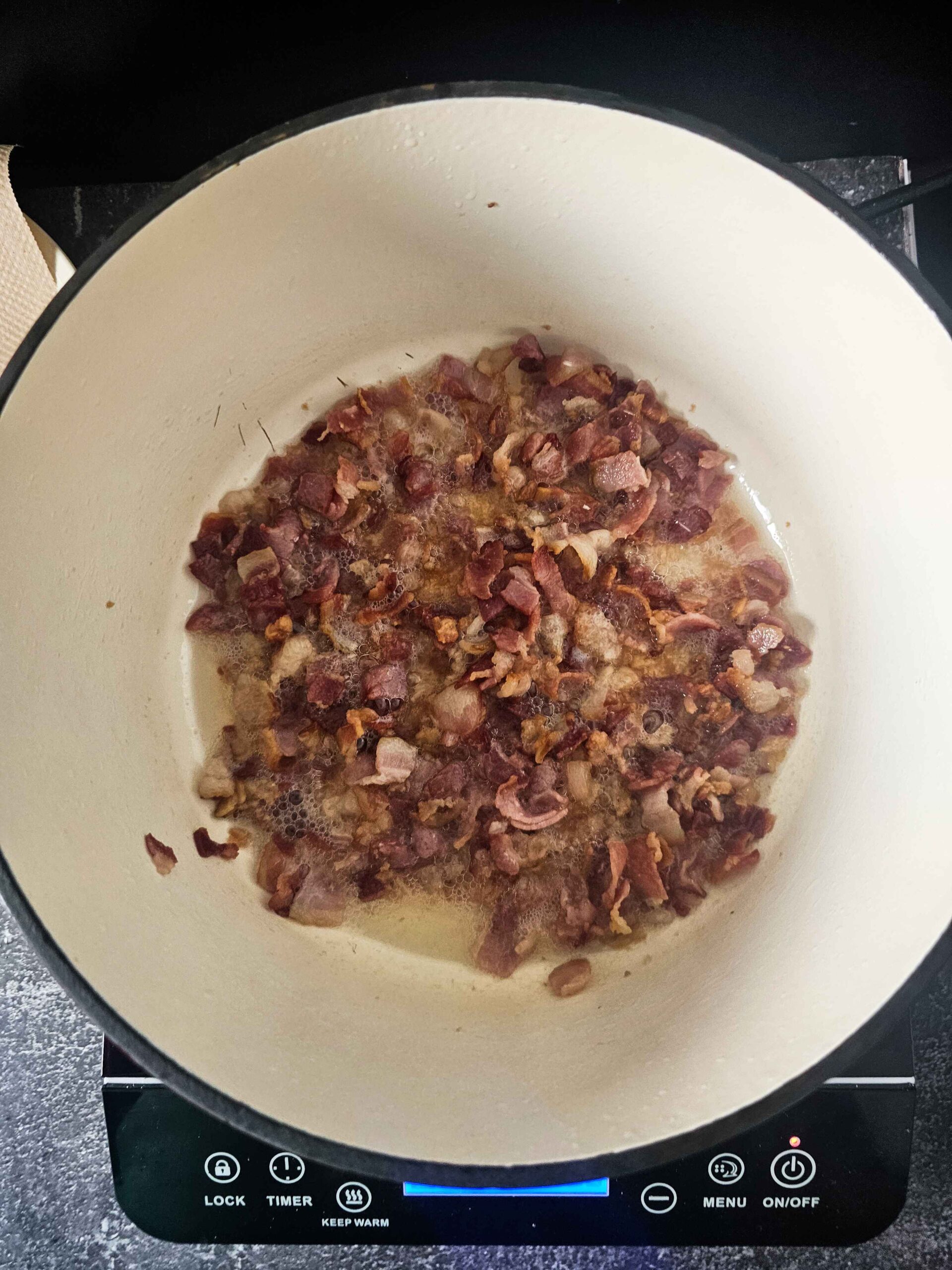 COOK THE BACON UNTIL CRISPY