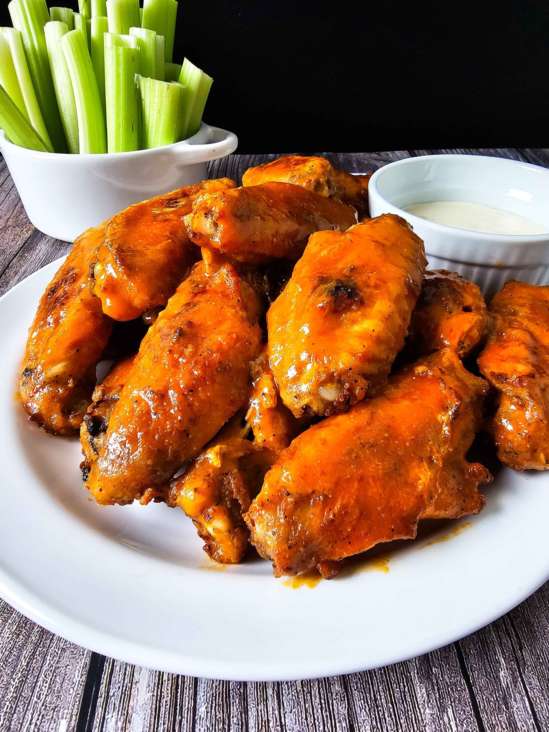 DIP THE WINGS INTO THE BUFFALO SAUCE