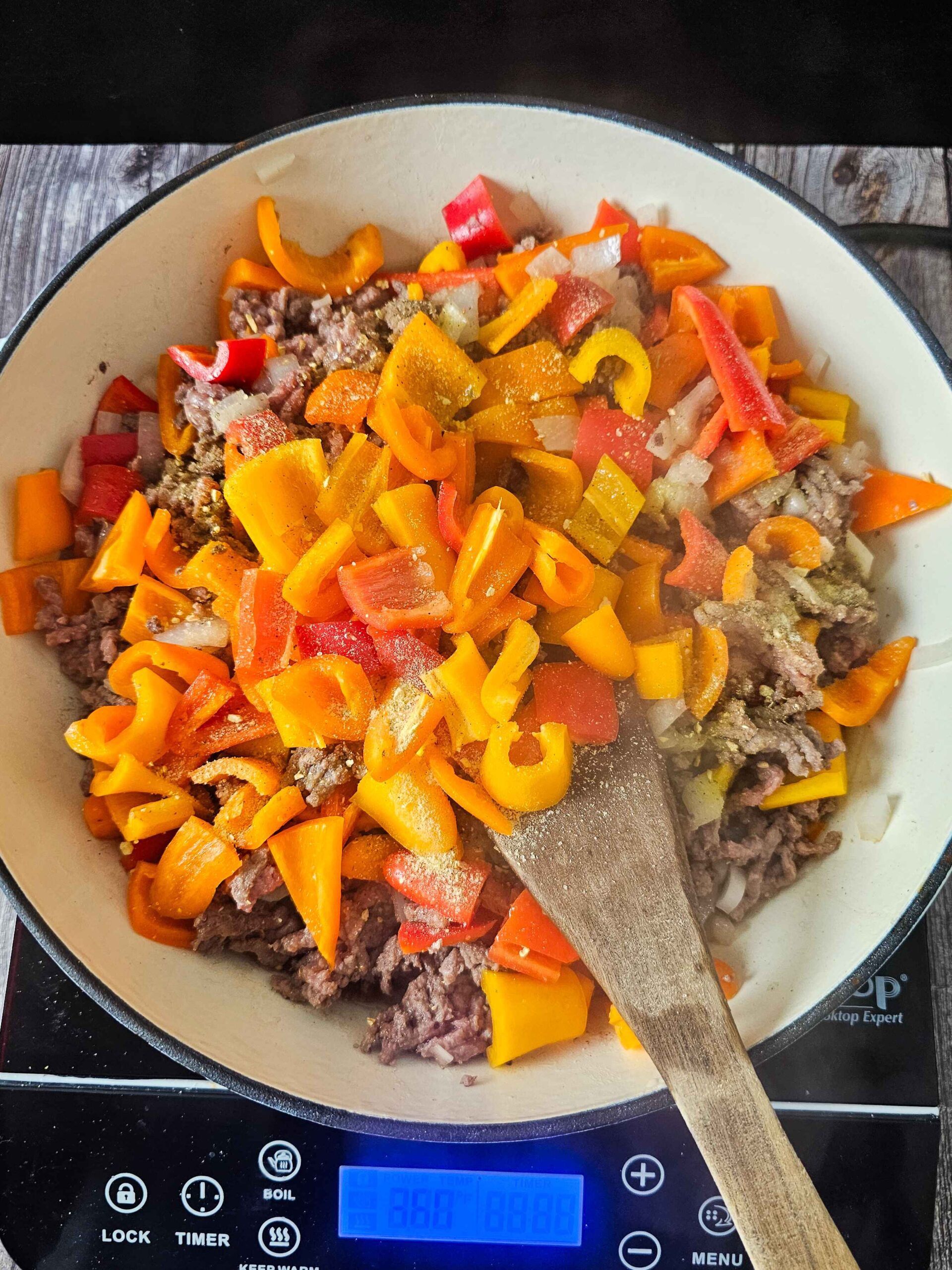 SAUTE THE GROUND BEEF AND VEGETABLES