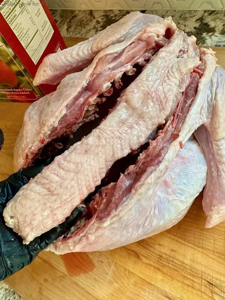 REMOVE THE SPINE FROM THE TURKEY