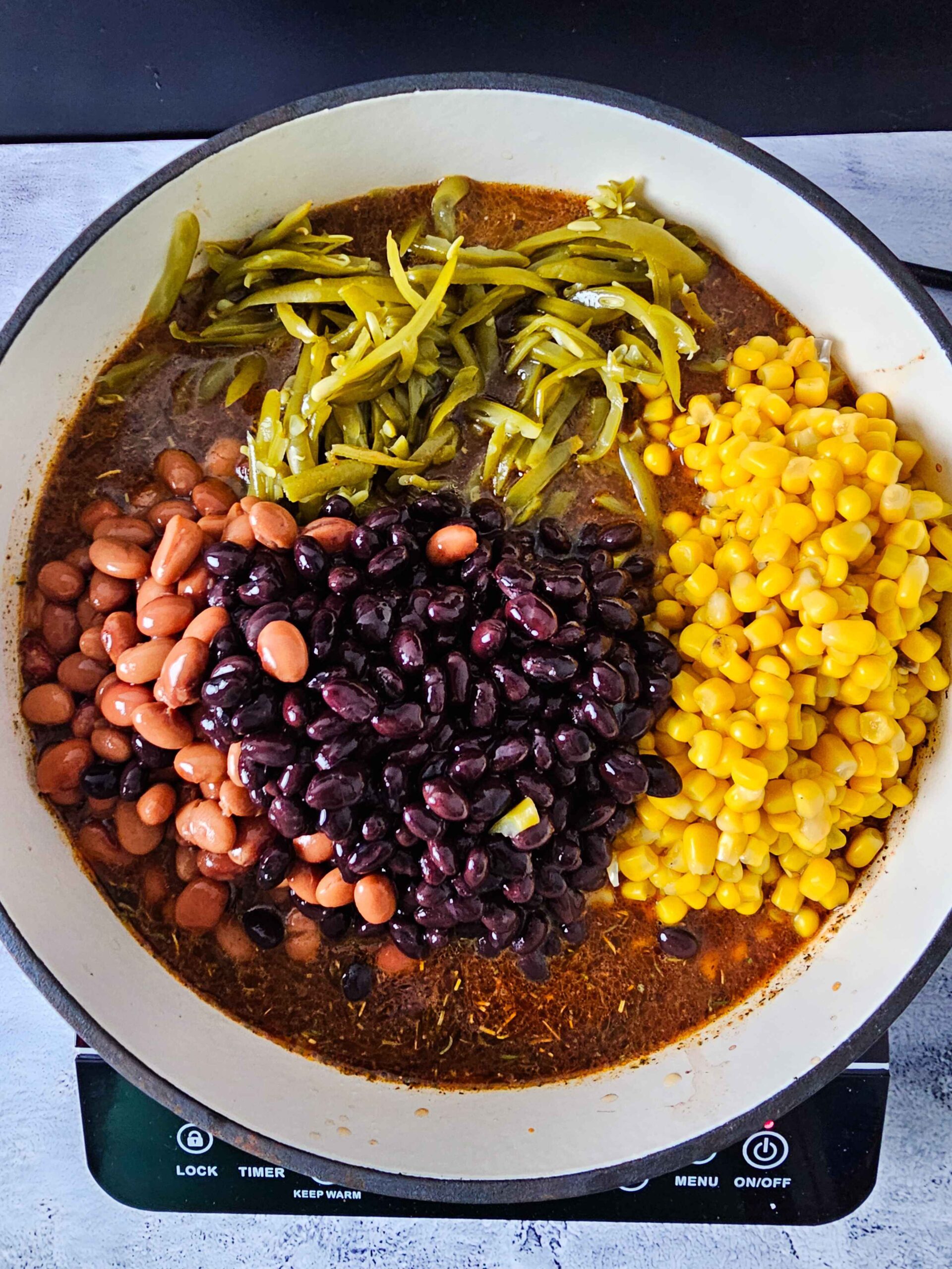 ADD BEANS, GREEN BEANS AND CORN