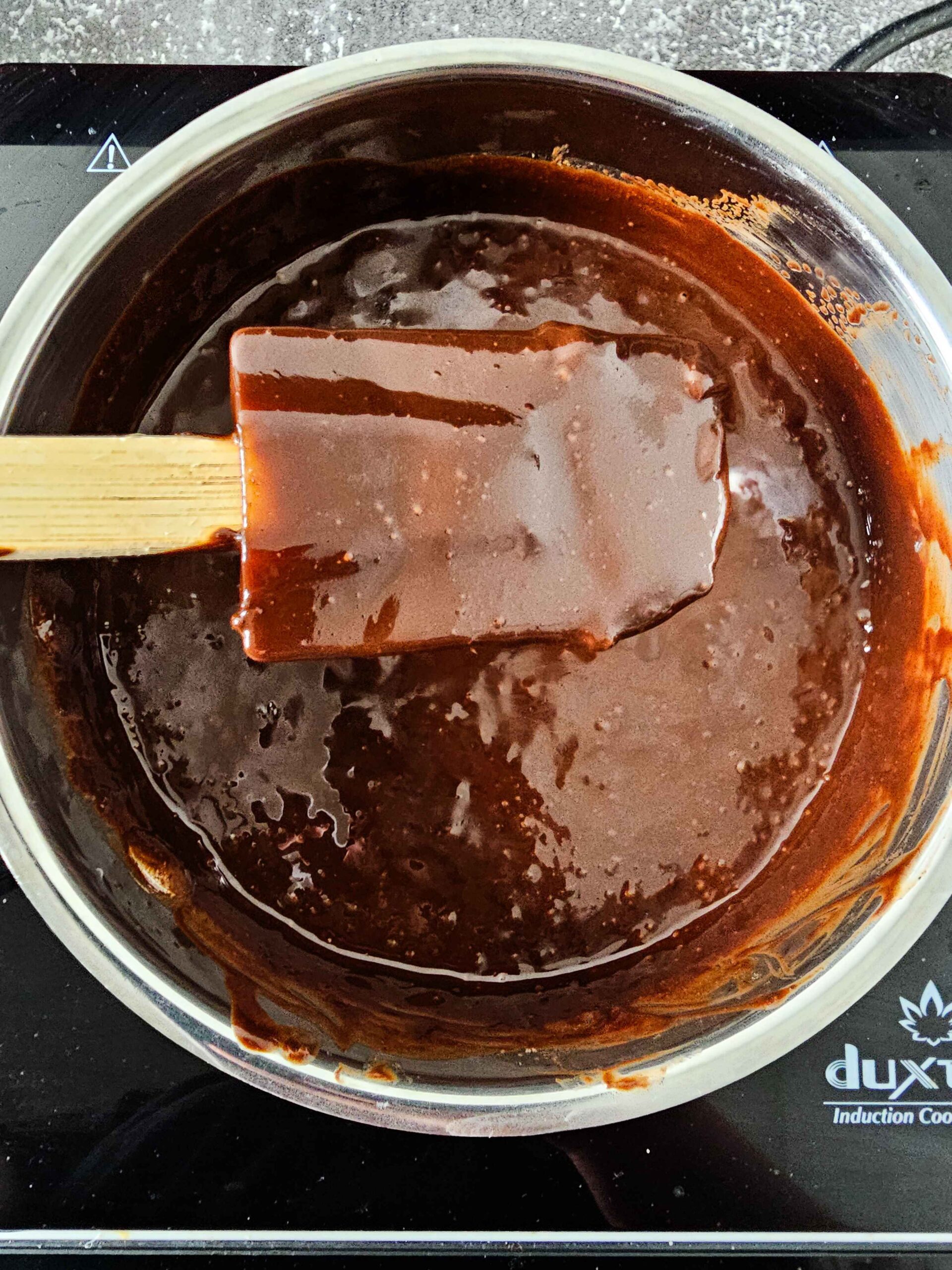 MELT THE BUTTER AND THE CHOCOLATE UNTIL MELTED