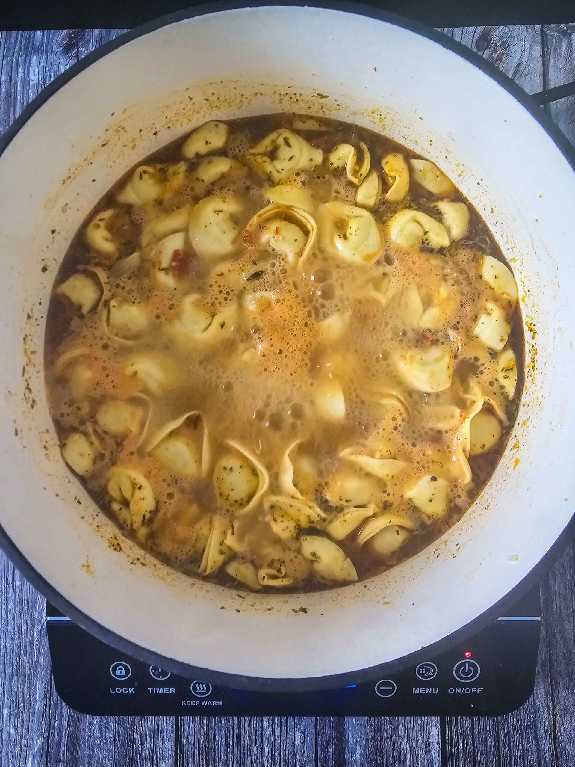 ADD THE TORTELLINI AND SIMMER FOR 5-10 MINUTES