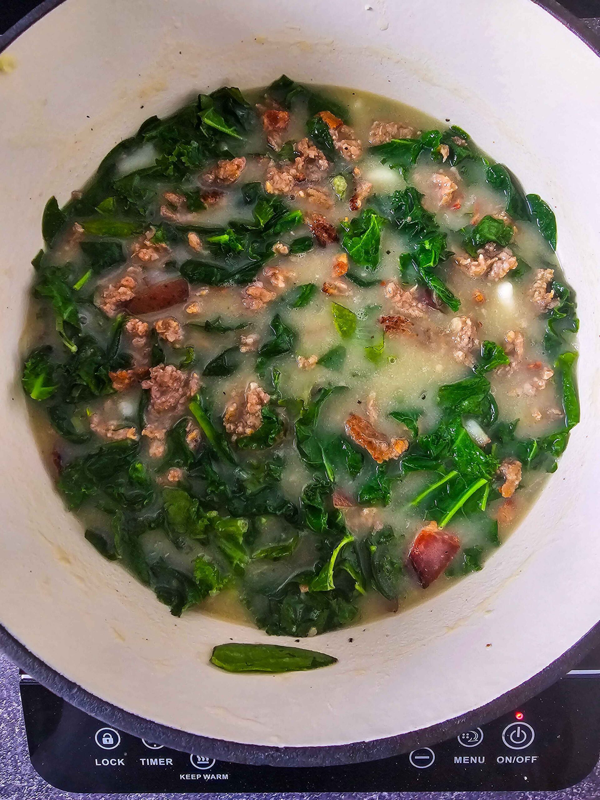 ADD CREAM, SPINACH AND MEATS