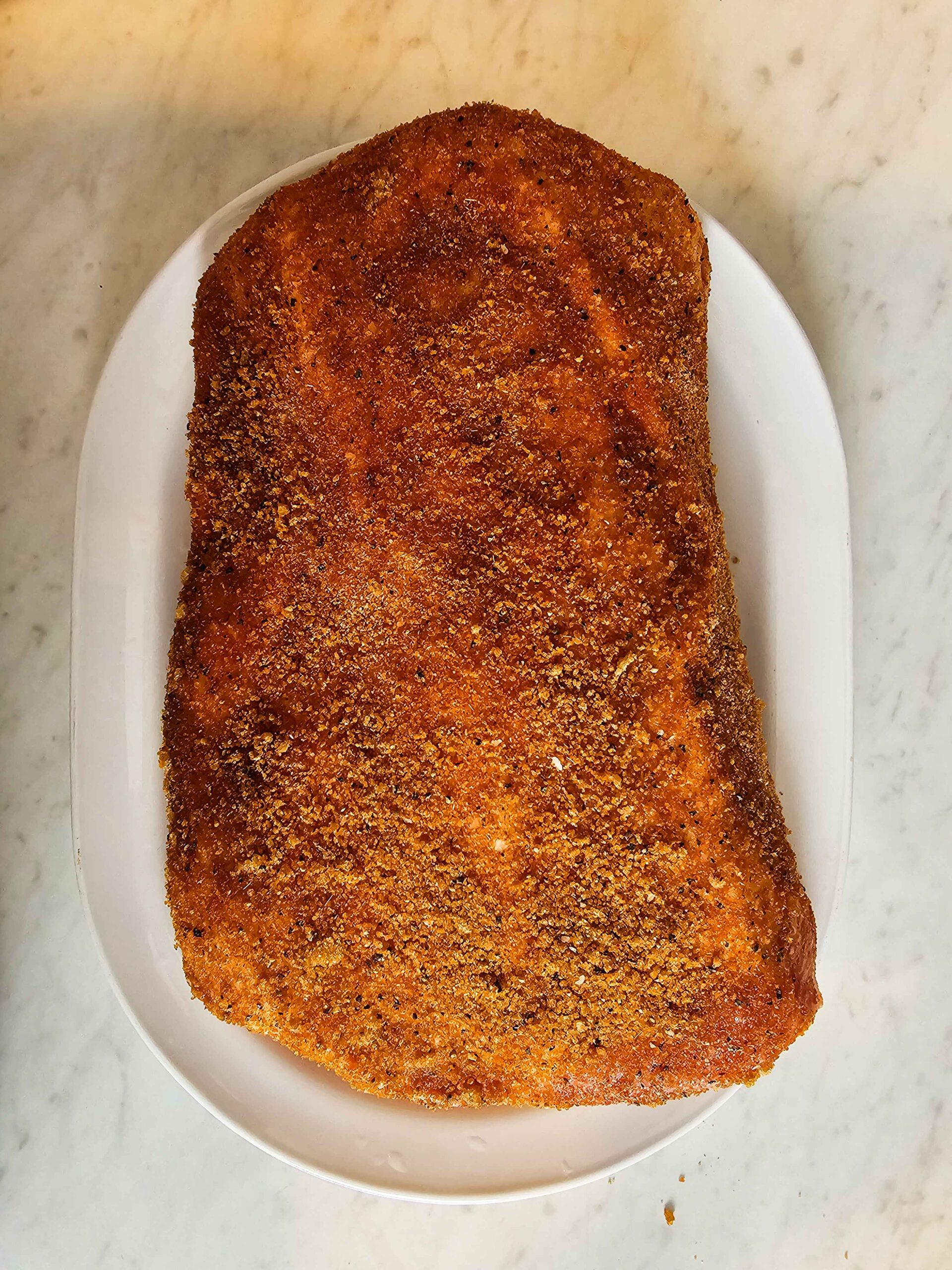 RUB THE SPICE RUB INTO TJE PORK LOIN