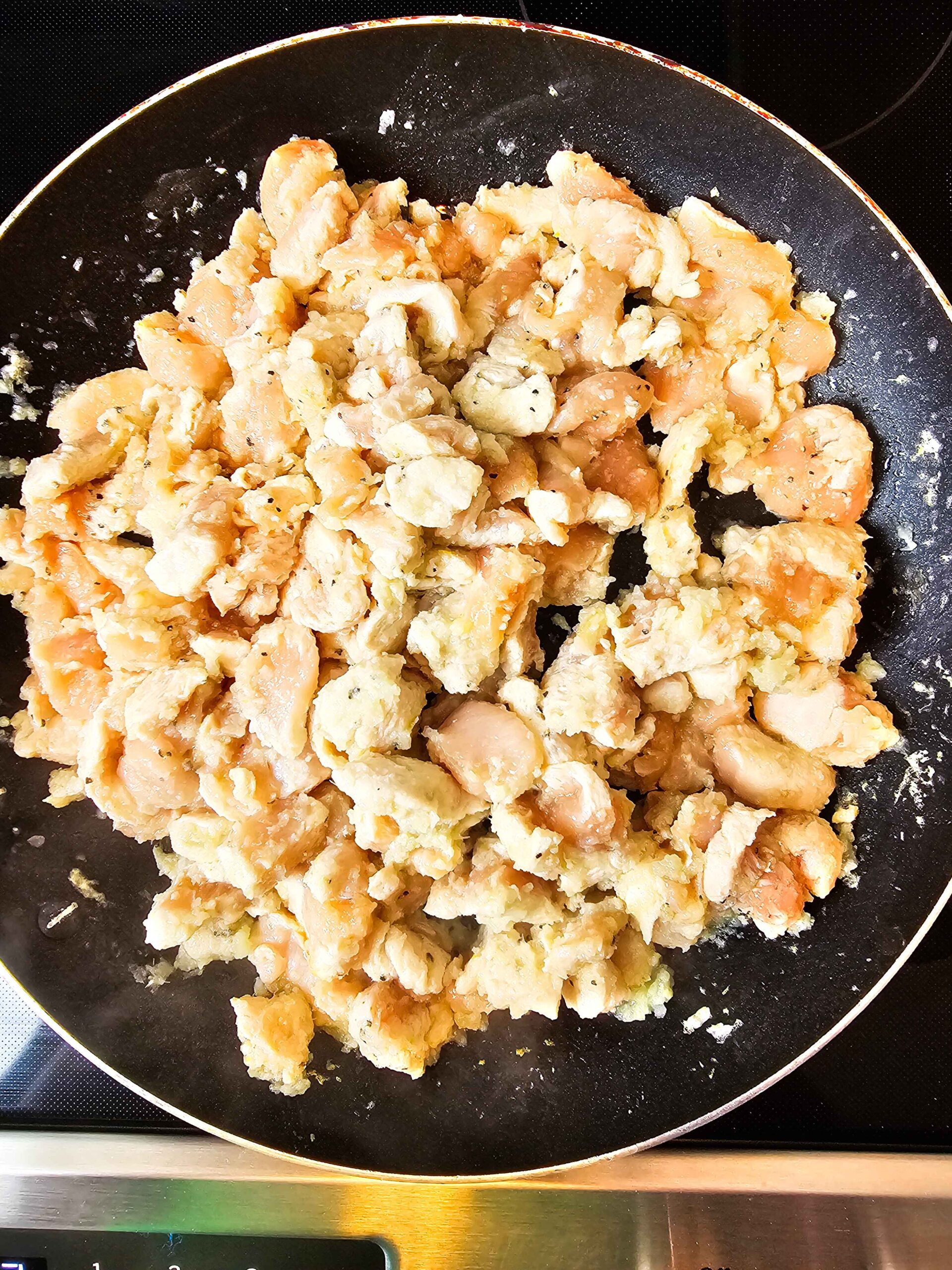 SAUTE THE CHICKEN, ONIONS AND GARLIC