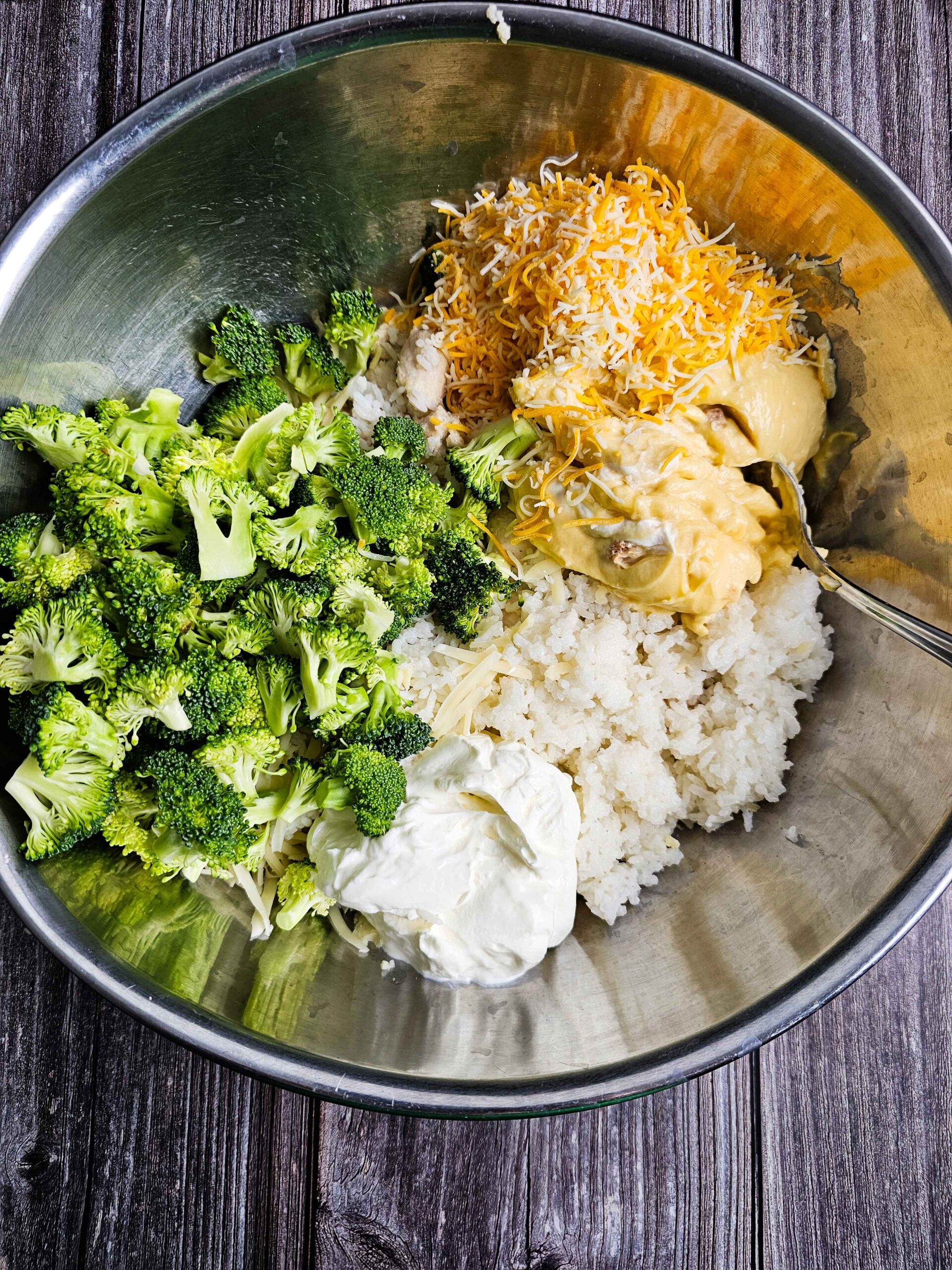 PREPARE THE BROCCOLI, RICE, SOUR CREAM, MILK AND CHEDDAR CHEESE