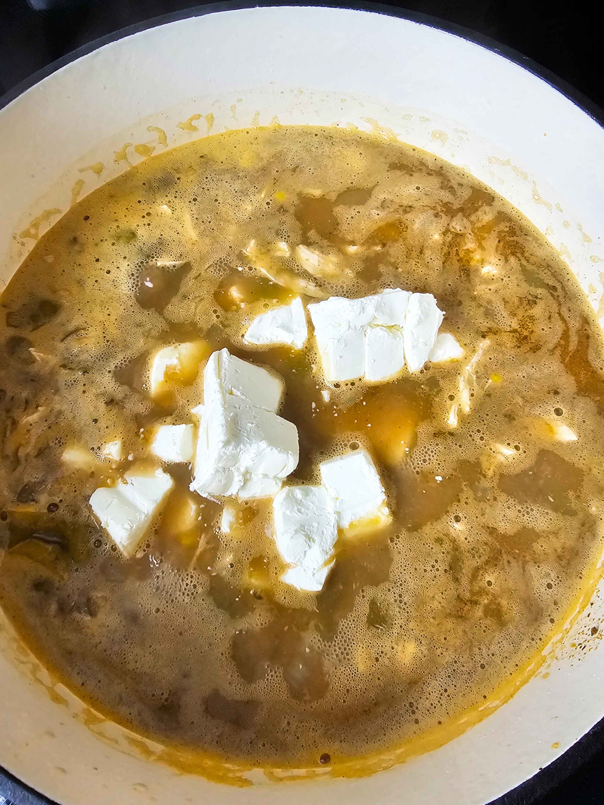 ADD THE SHREDDED CHICKEN AND CREAM CHEESE TO THE POT