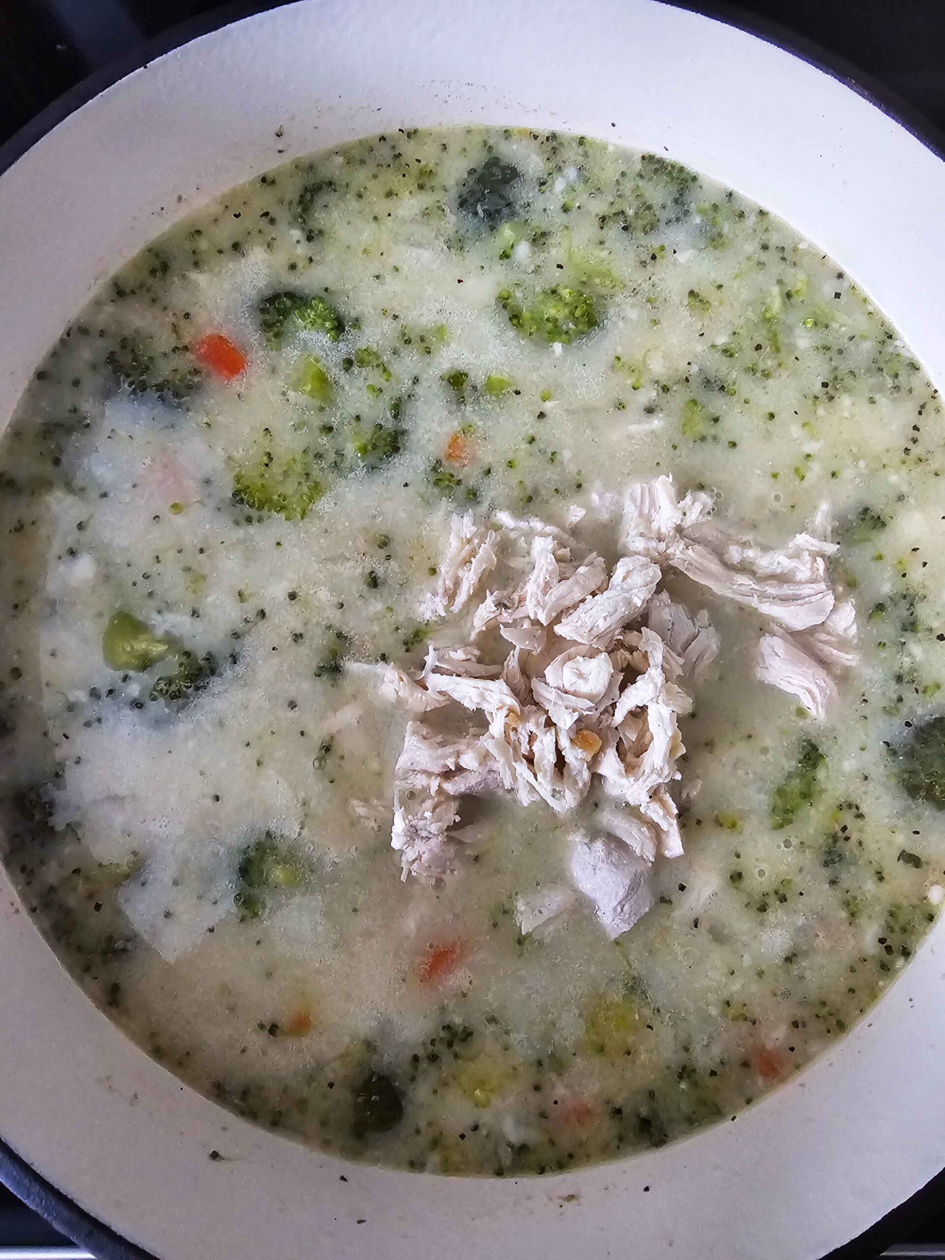 ADD THE SHREDDED CHICKEN BREAST BACK TO THE POT.