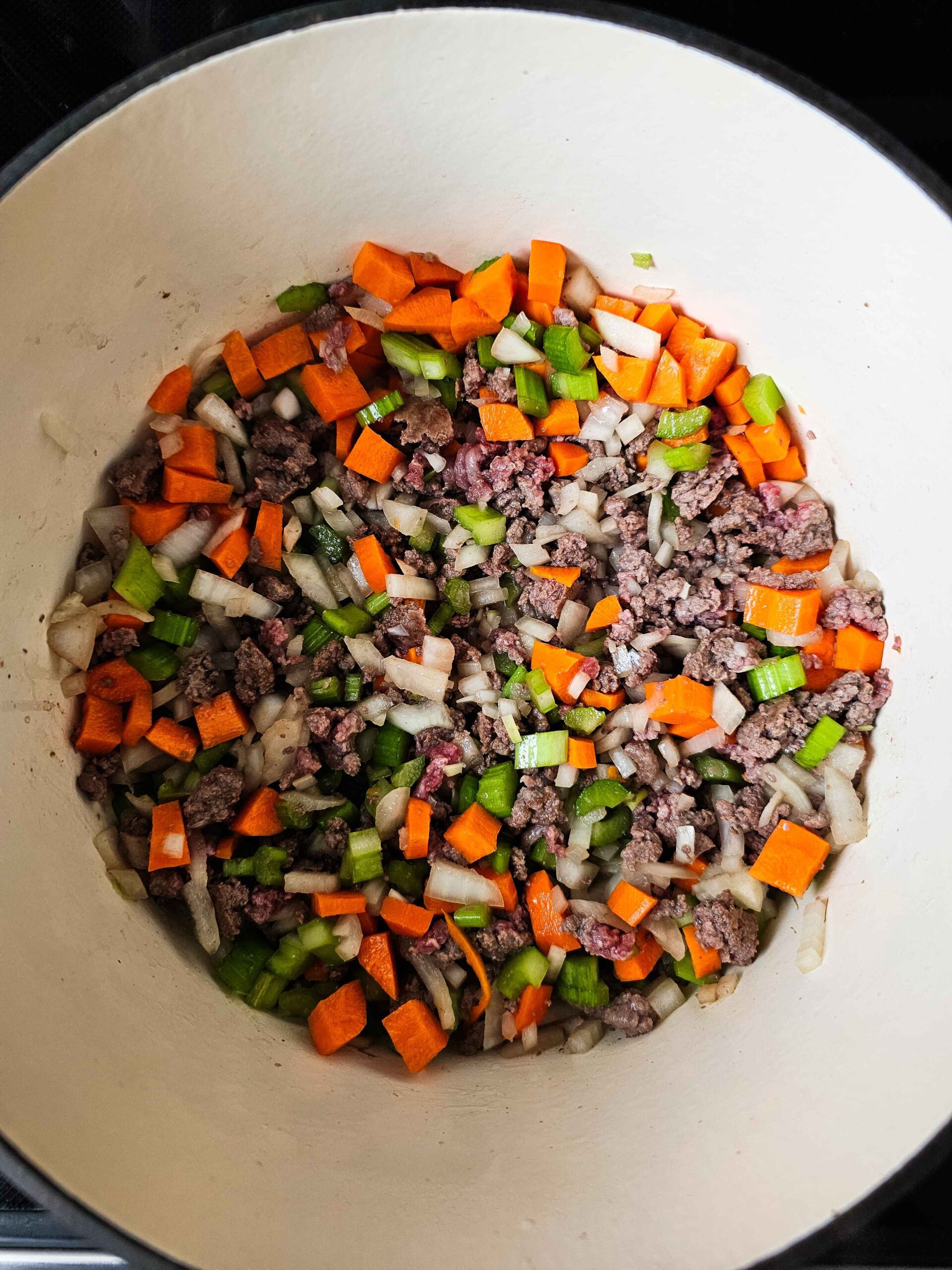 ADD THE VEGETABLES AND SAUTE UNTIL SOFTENED