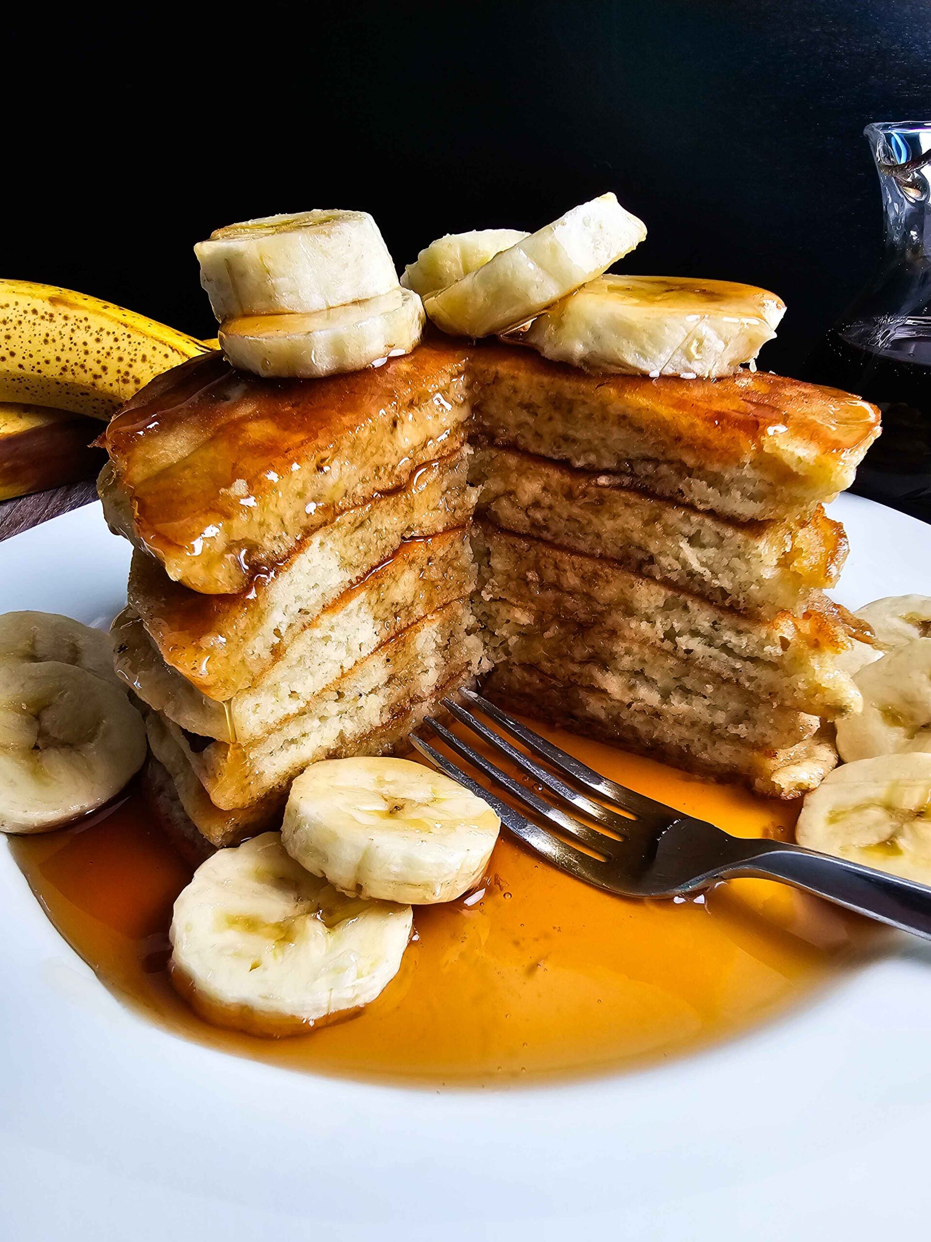 STACK THE FLUFFY BANANA PANCAKES AND SERVE WITH WARM MAPLE SYRUP