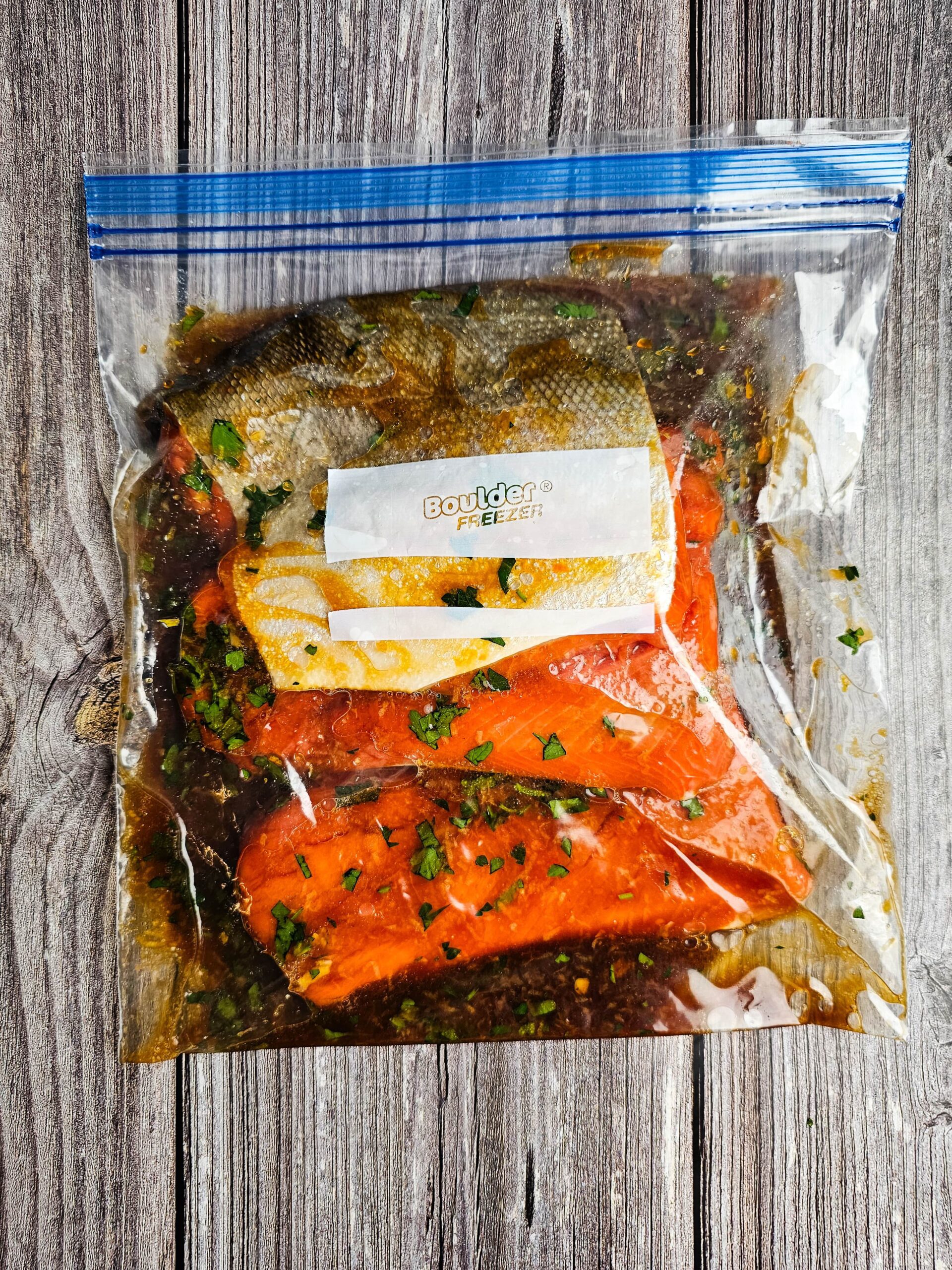 MARINATE THE SALMON IN A ZIP TOP BAG FOR AT LEAST TWO HOURS