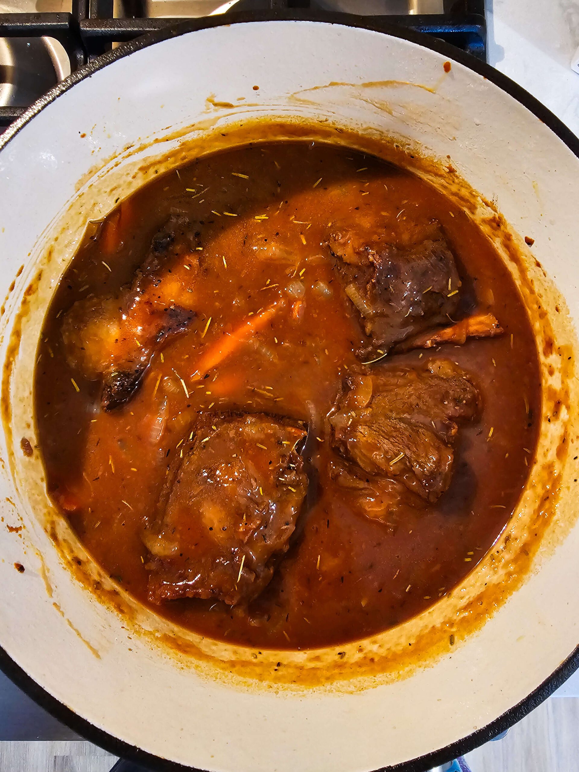 ADD THE SHORT RIBS BACK TO THE SAUCE