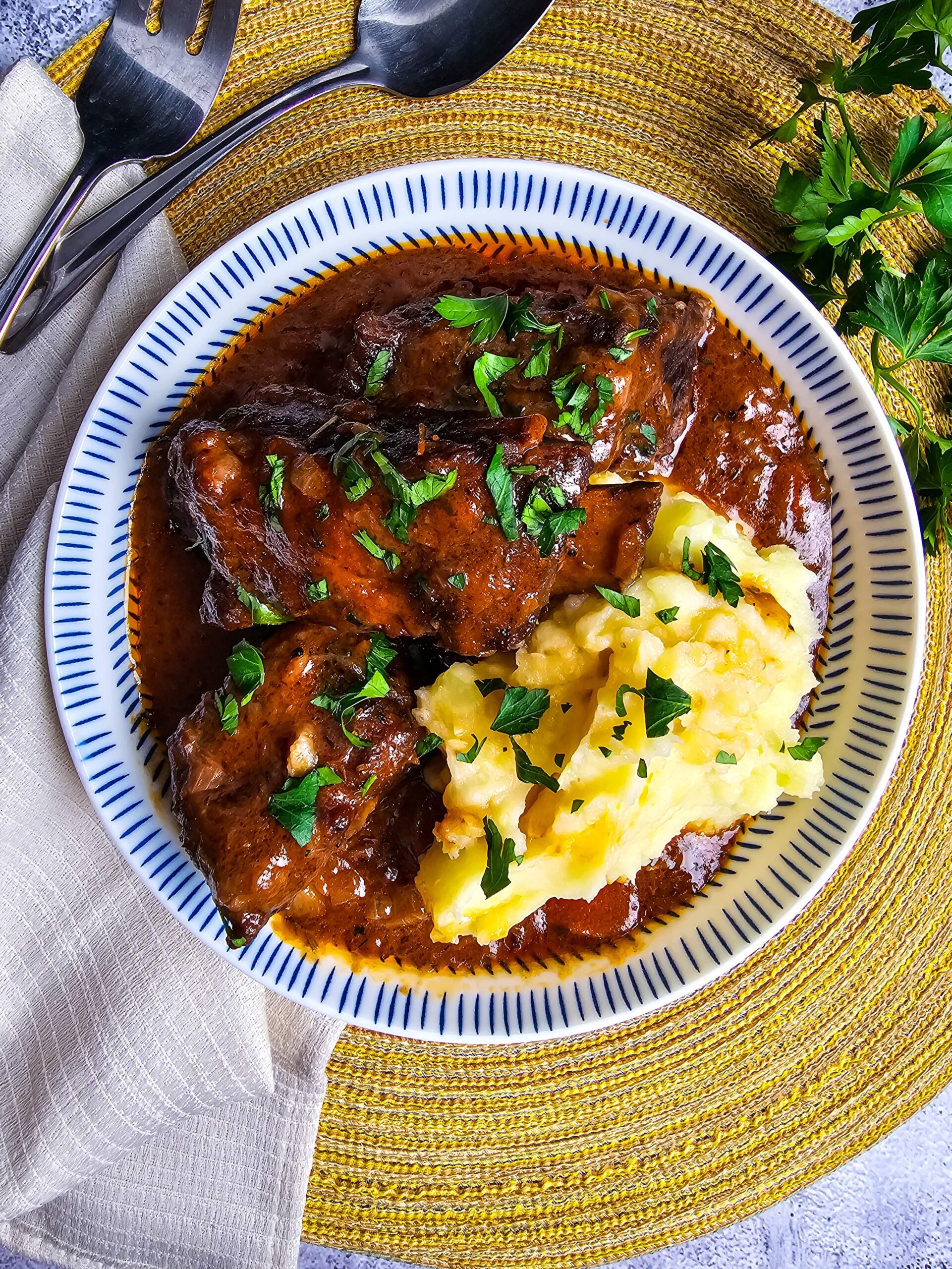 SERVE AND ENJOY OVER A BED OF MASHED POTATOES OR COOKED NOODLES