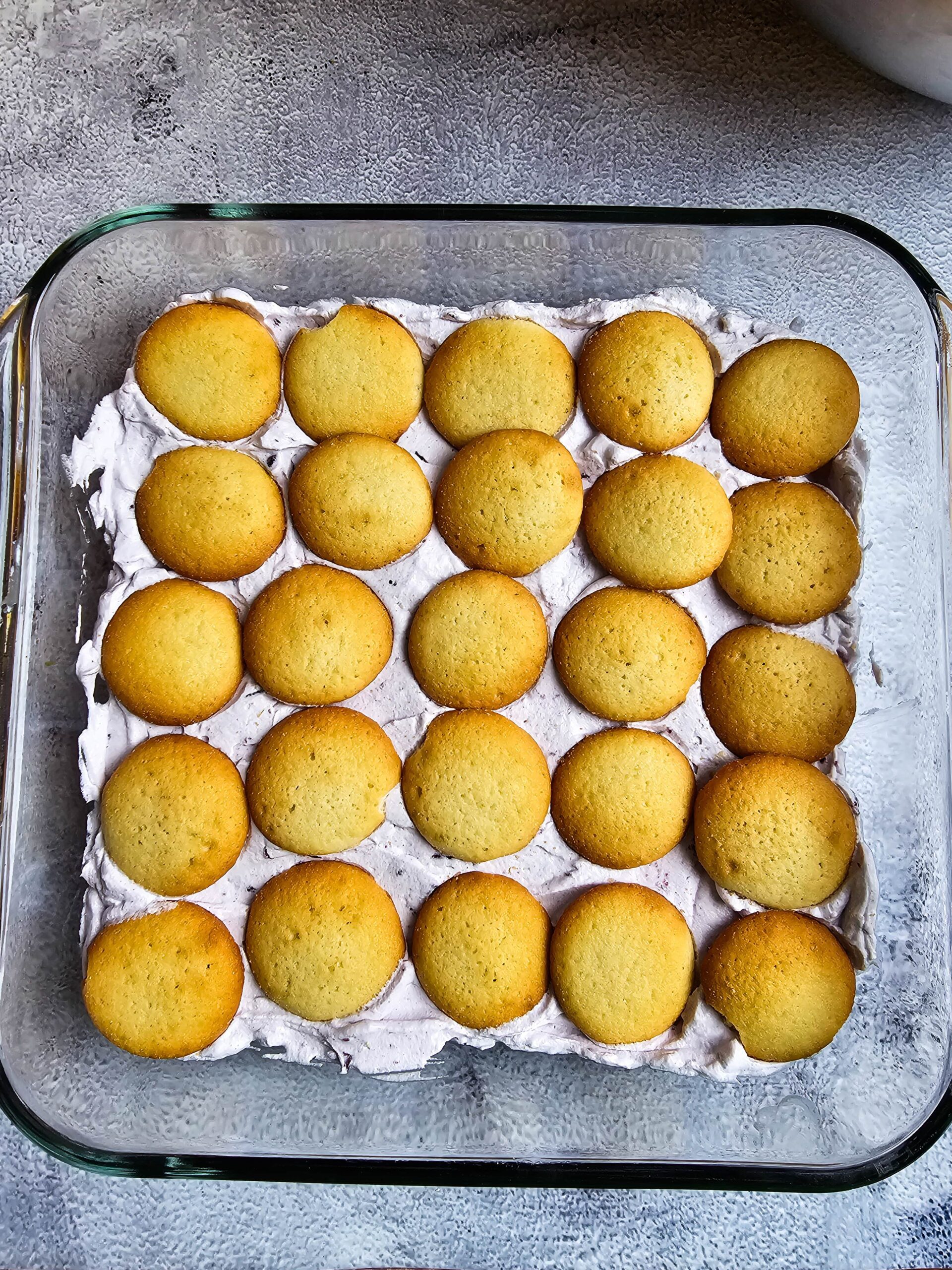 BEGIN BY LAYERING THE BLUEBERRY LEMON CAKE