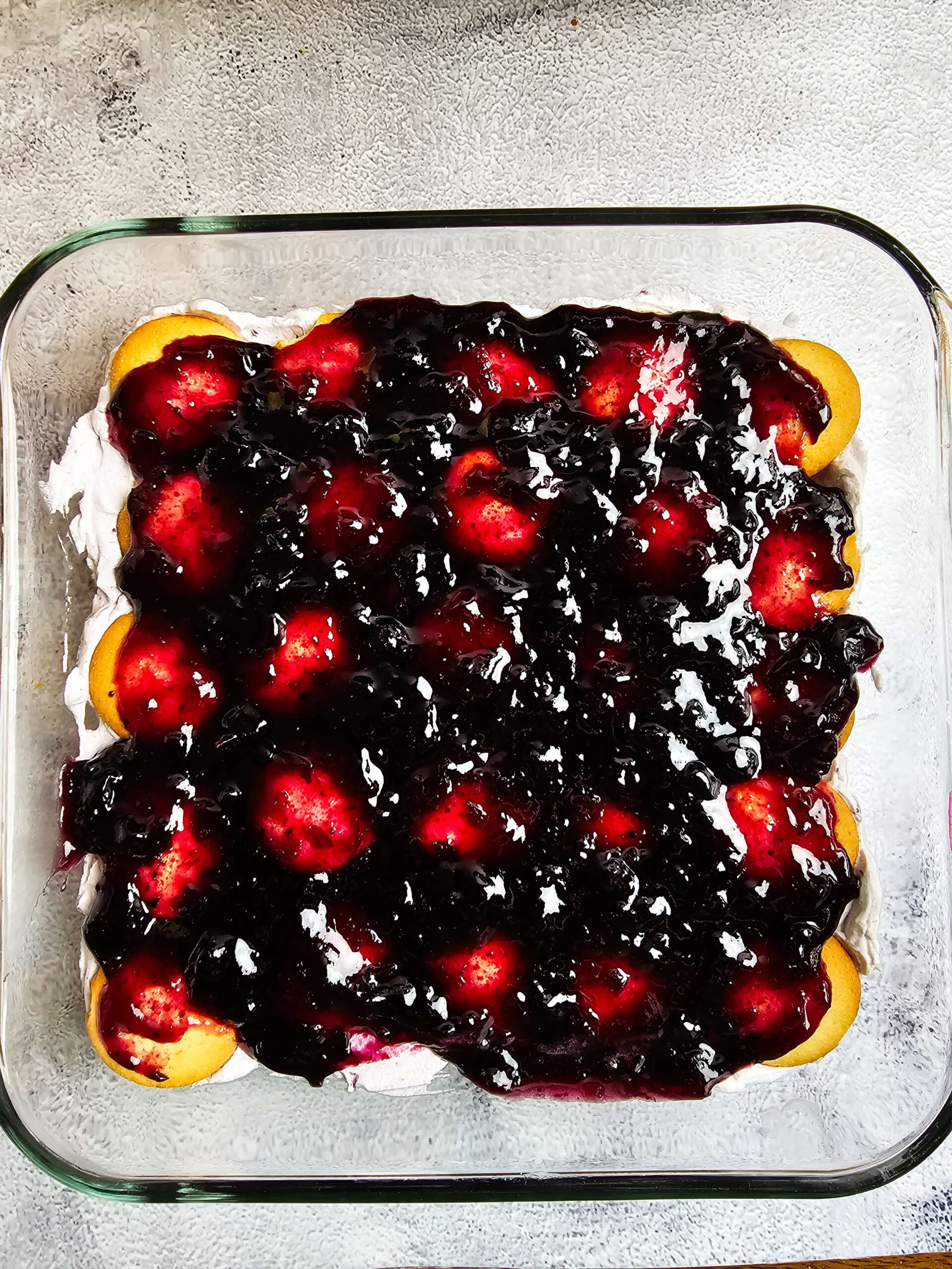 SPREAD THE REMAINING BLUEBERRY JAM IN BETWEEN THE LAYERS