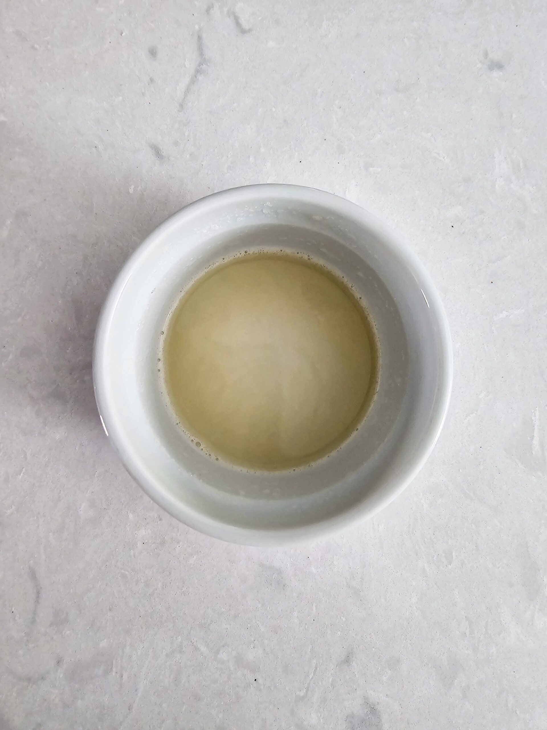 COMBINE THE COLD WATER AND UNFLAVORED GELATIN