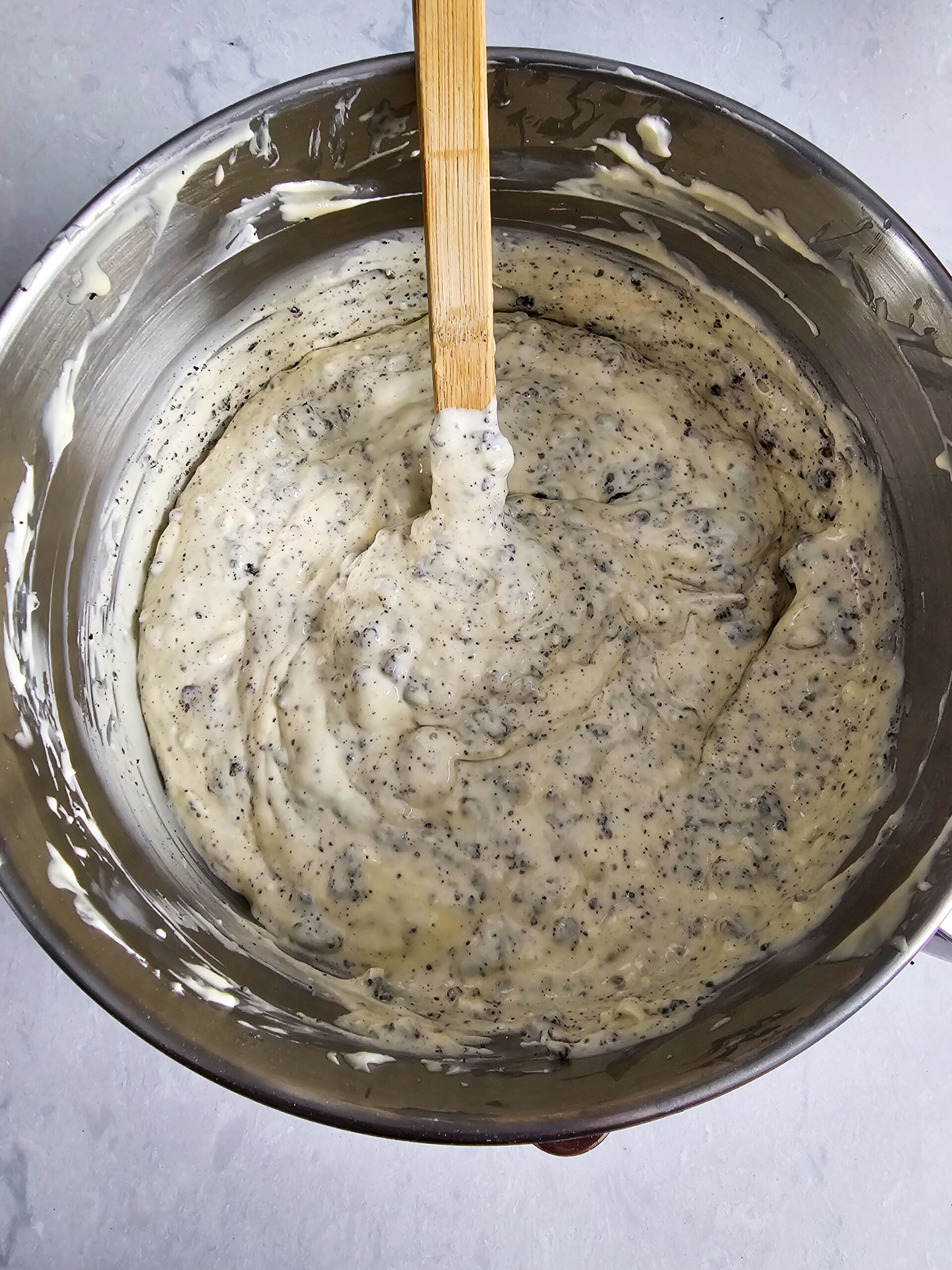 FOLD IN THE CRUSHED OREO COOKIES