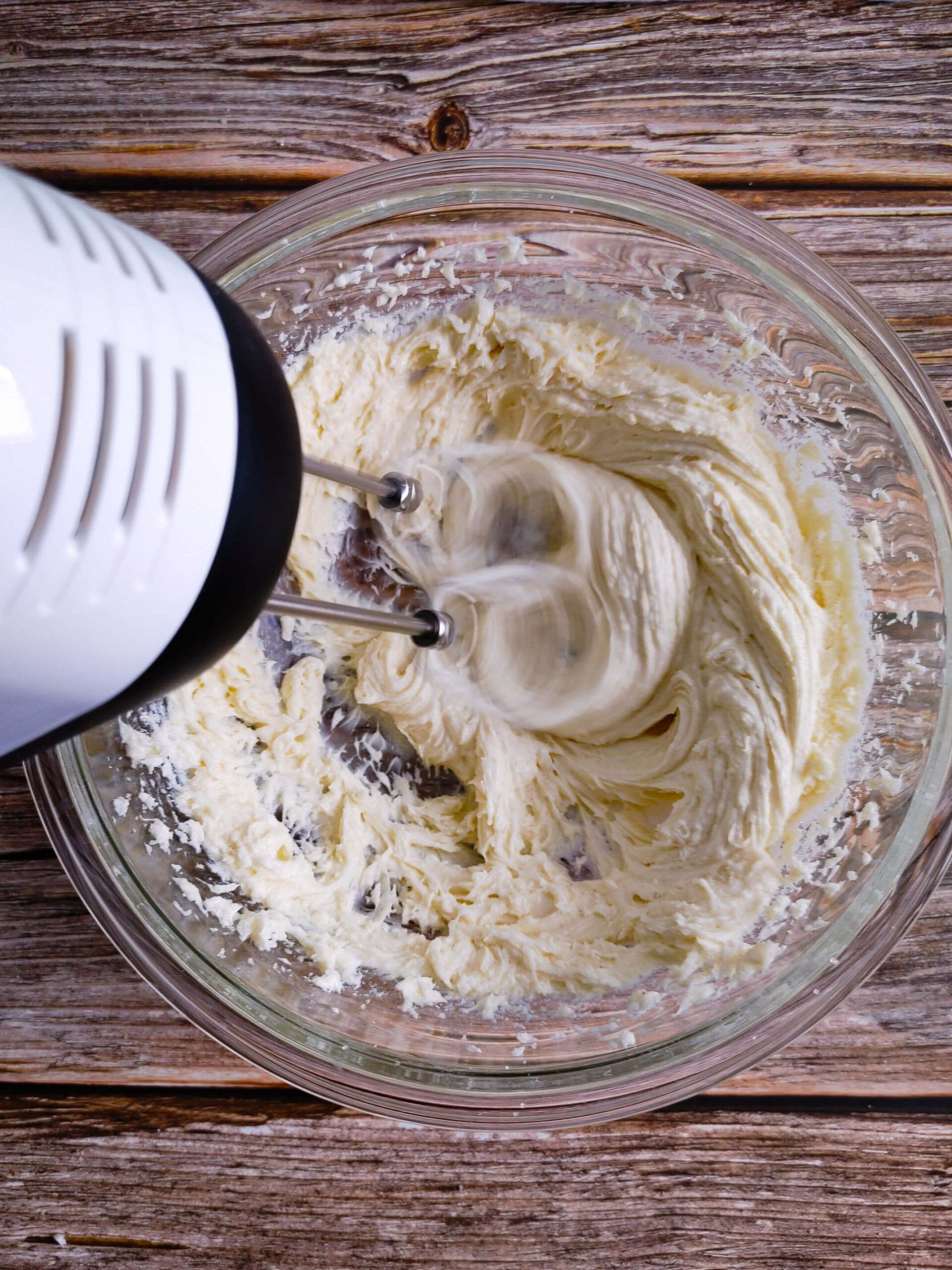 WHIP THE HEAVY CREAM INTO STIFF PEAKS