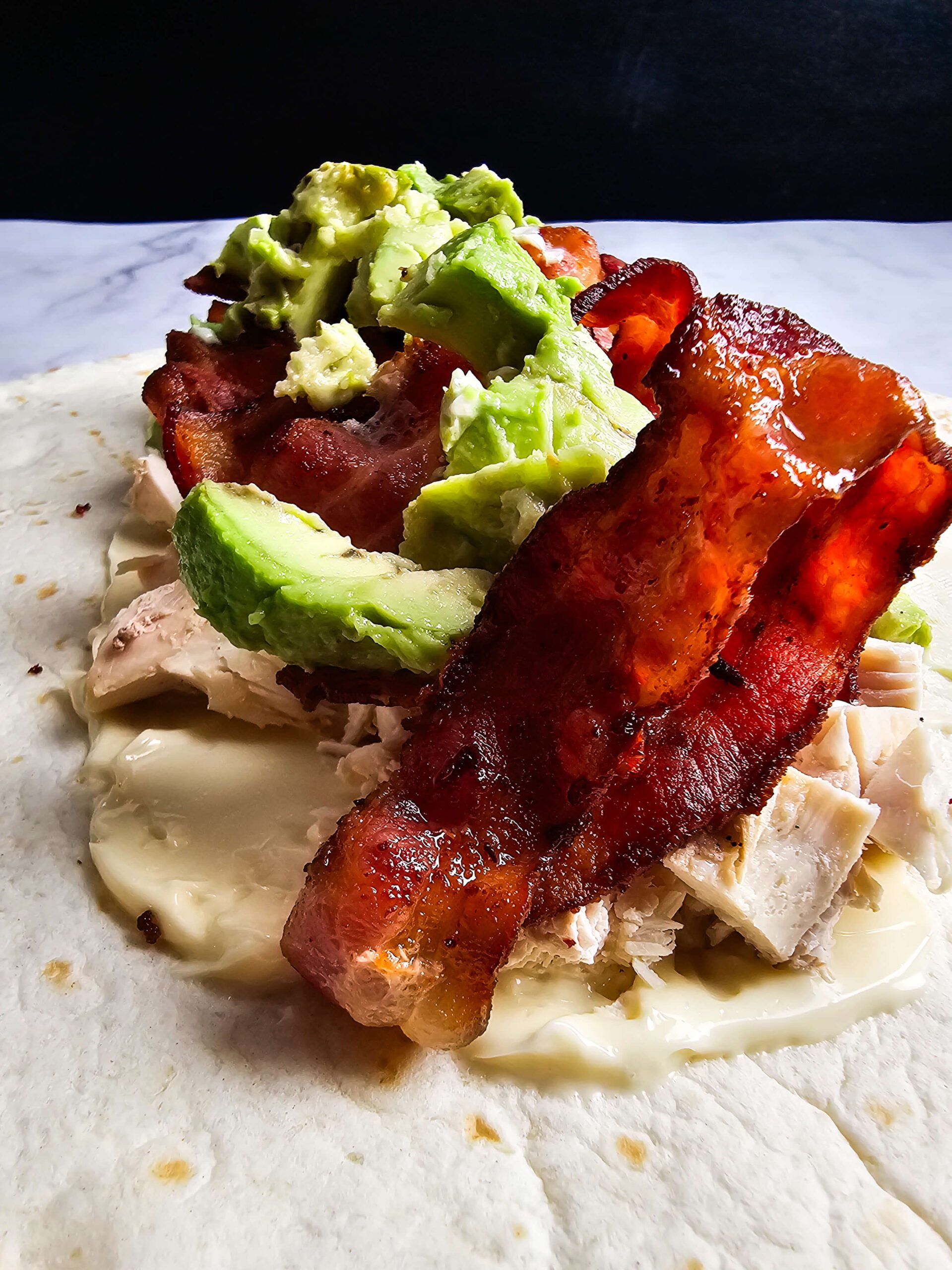 ADD THE AVOCADO AND TOMATO