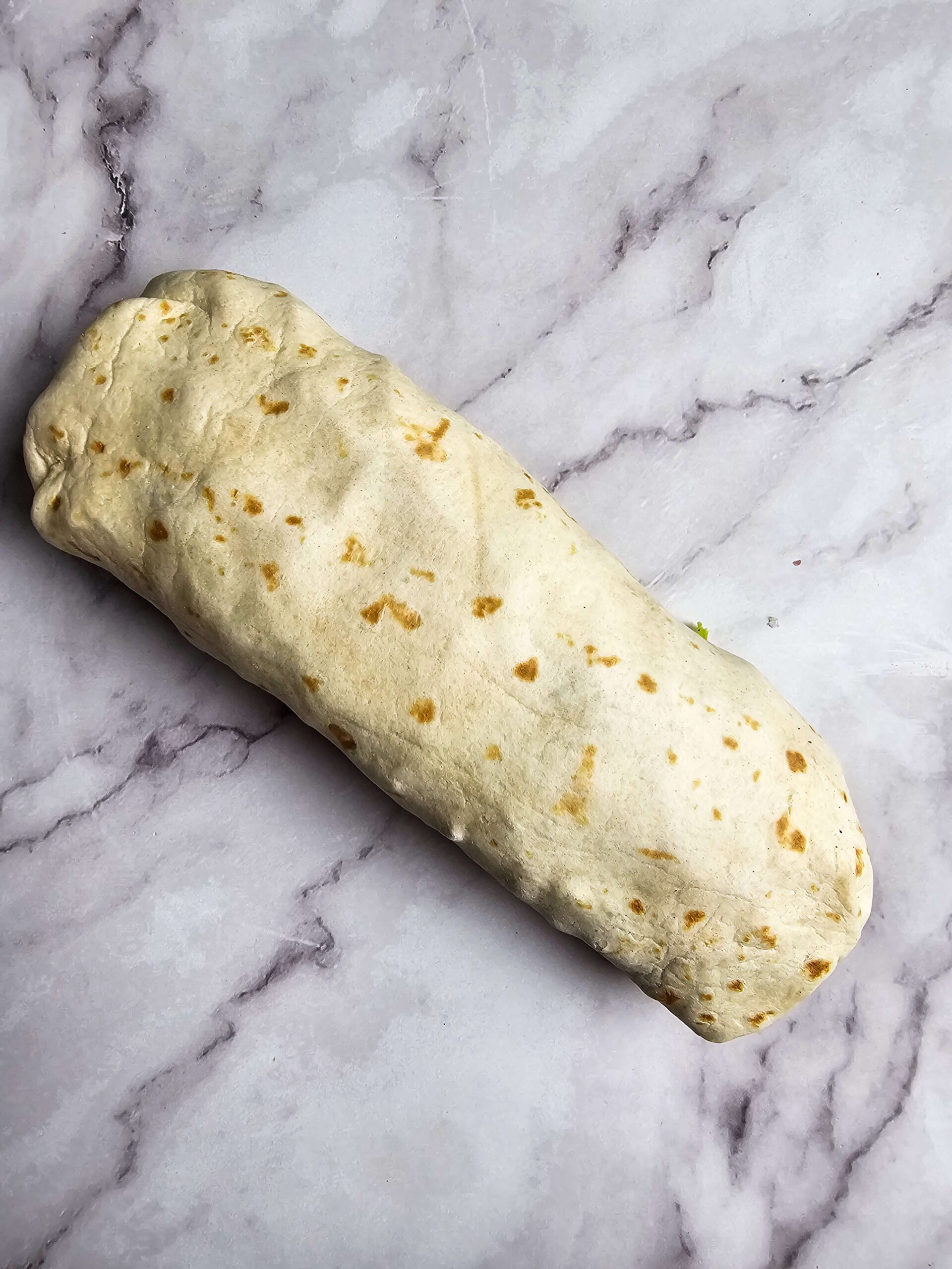 ROLL UP THE TORTILLA NICE AND TIGHT