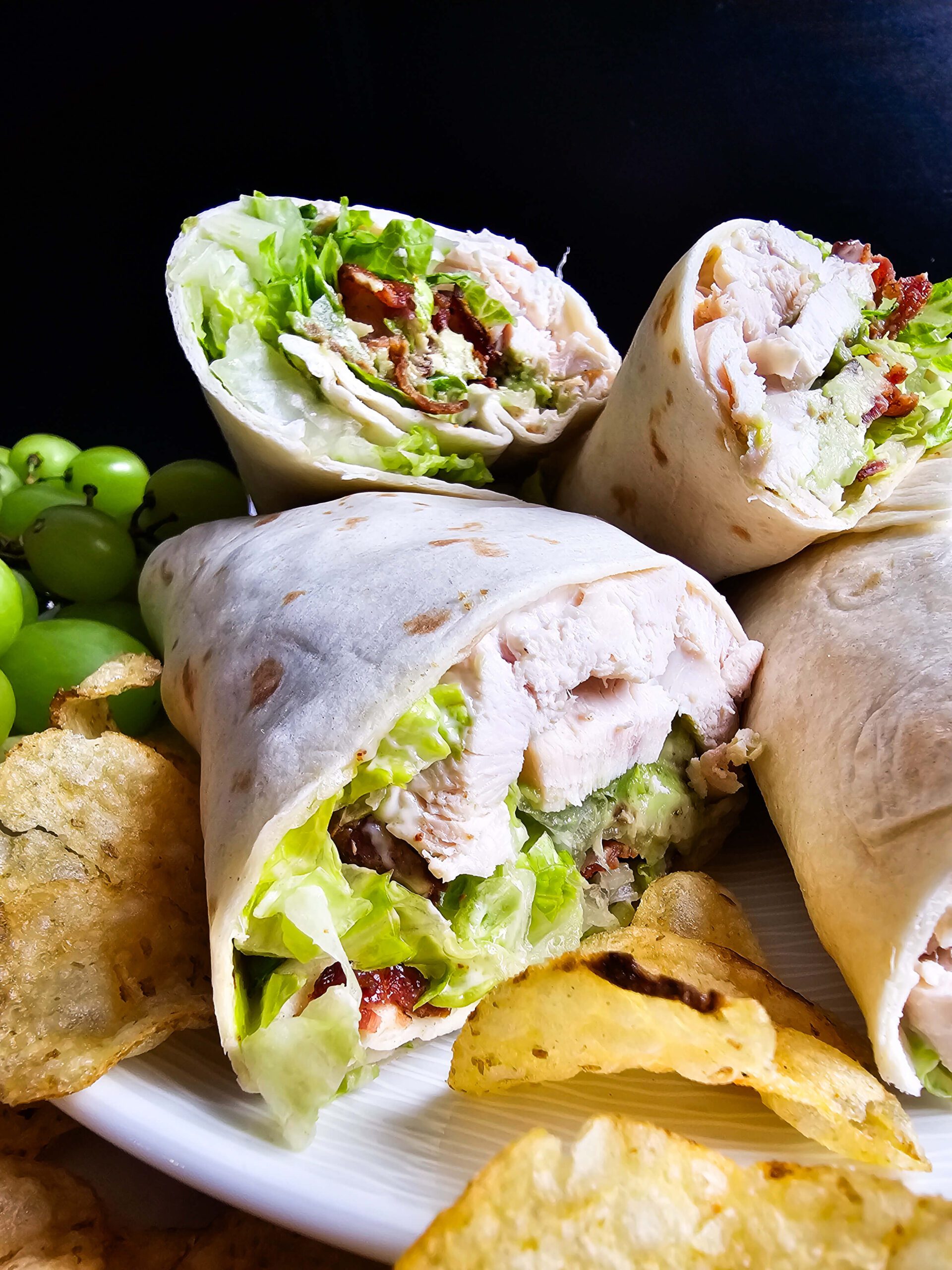 CUT THE WRAPS IN HALF AND SERVE