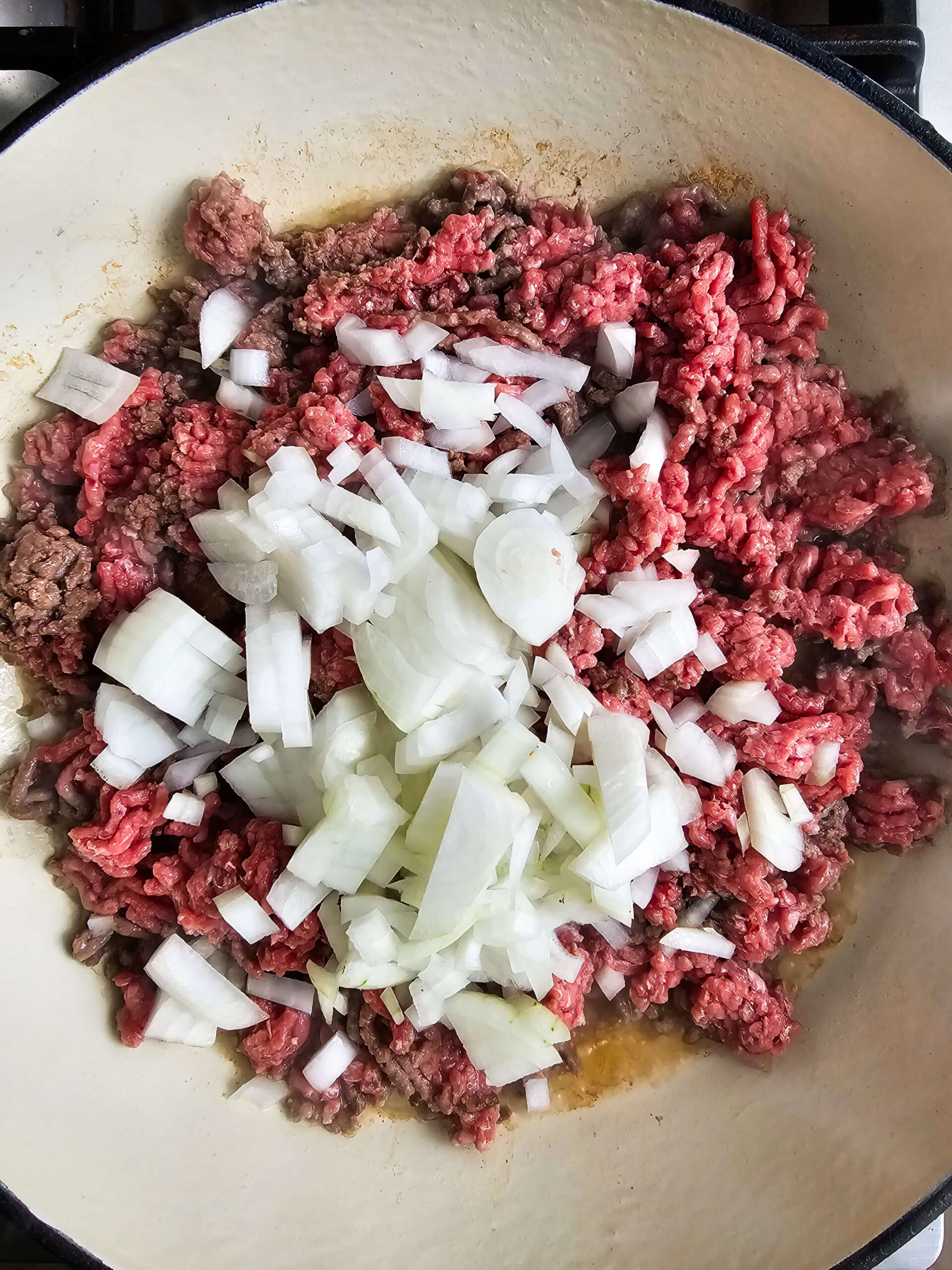 SAUTE THE GROUND BEEF AND ONIONS