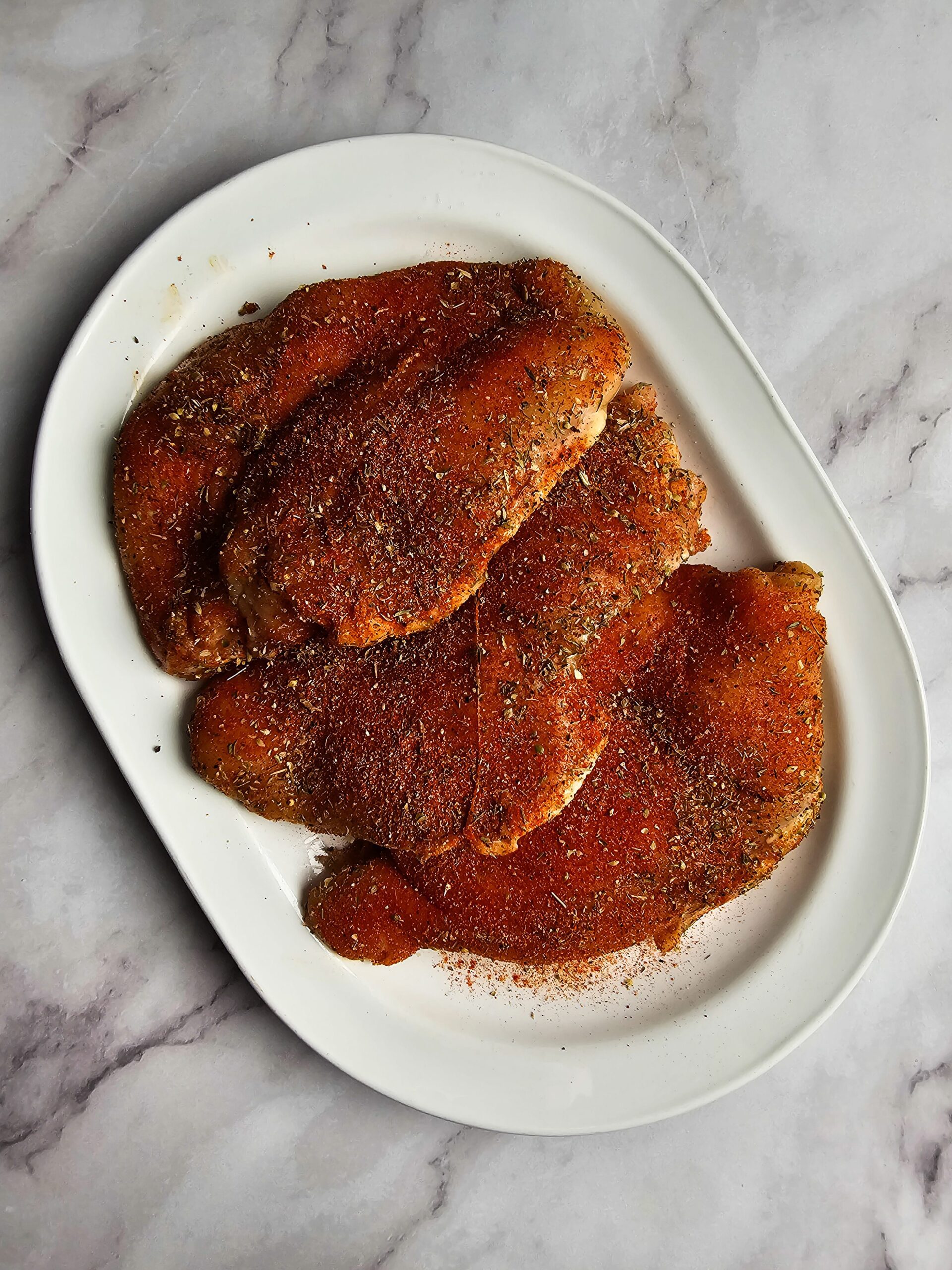 SEASON THE CHICKEN BREAST