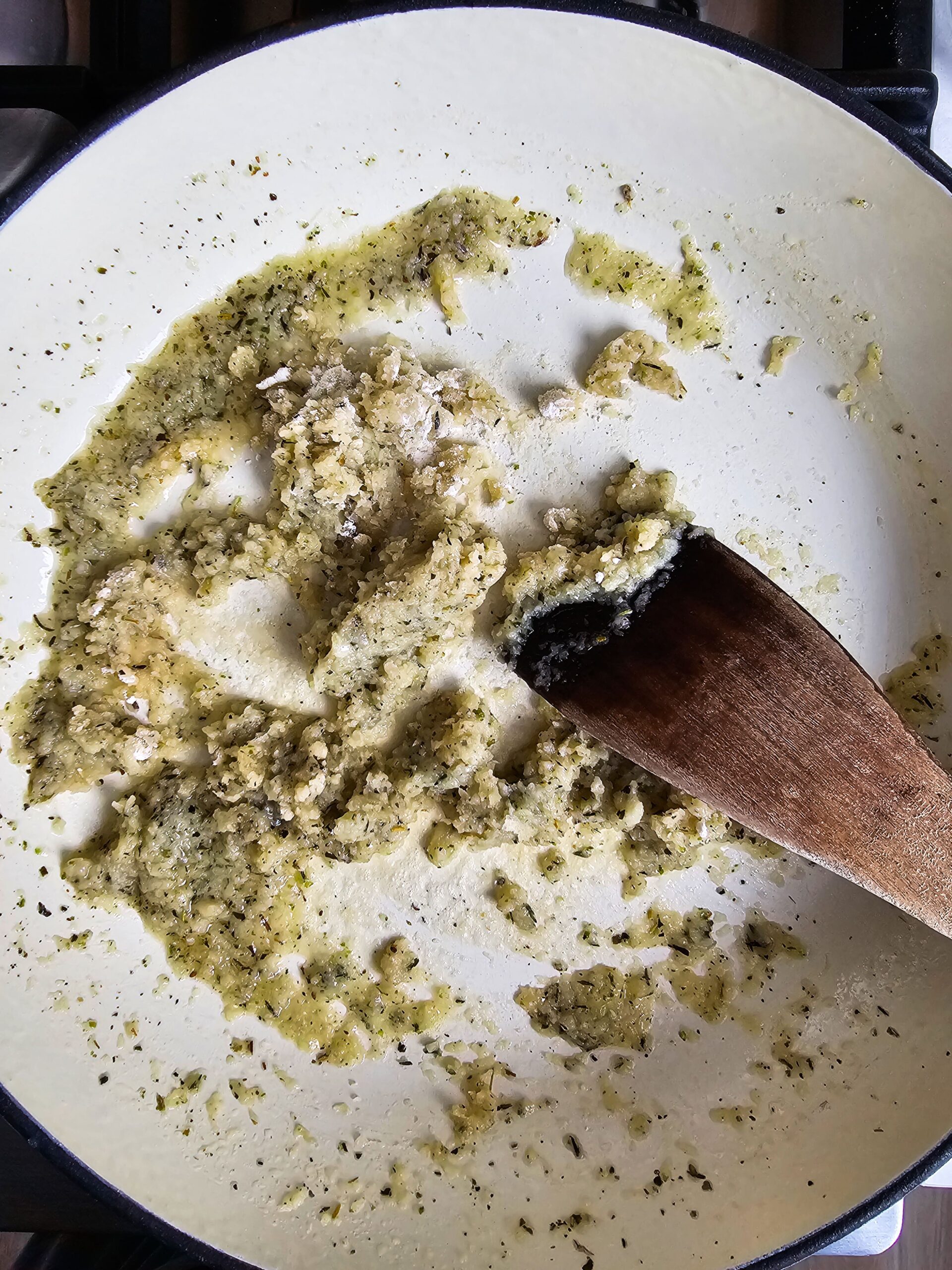 SAUTE THE ONIONS, GARLIC, SPICES AND FLOUR