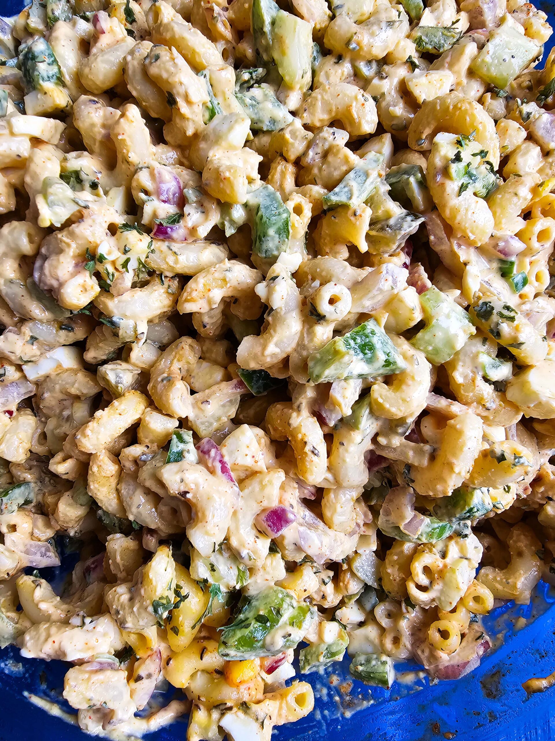 COMBINE ALL THE INGREDIENTS AND STIR THE PASTA SALAD
