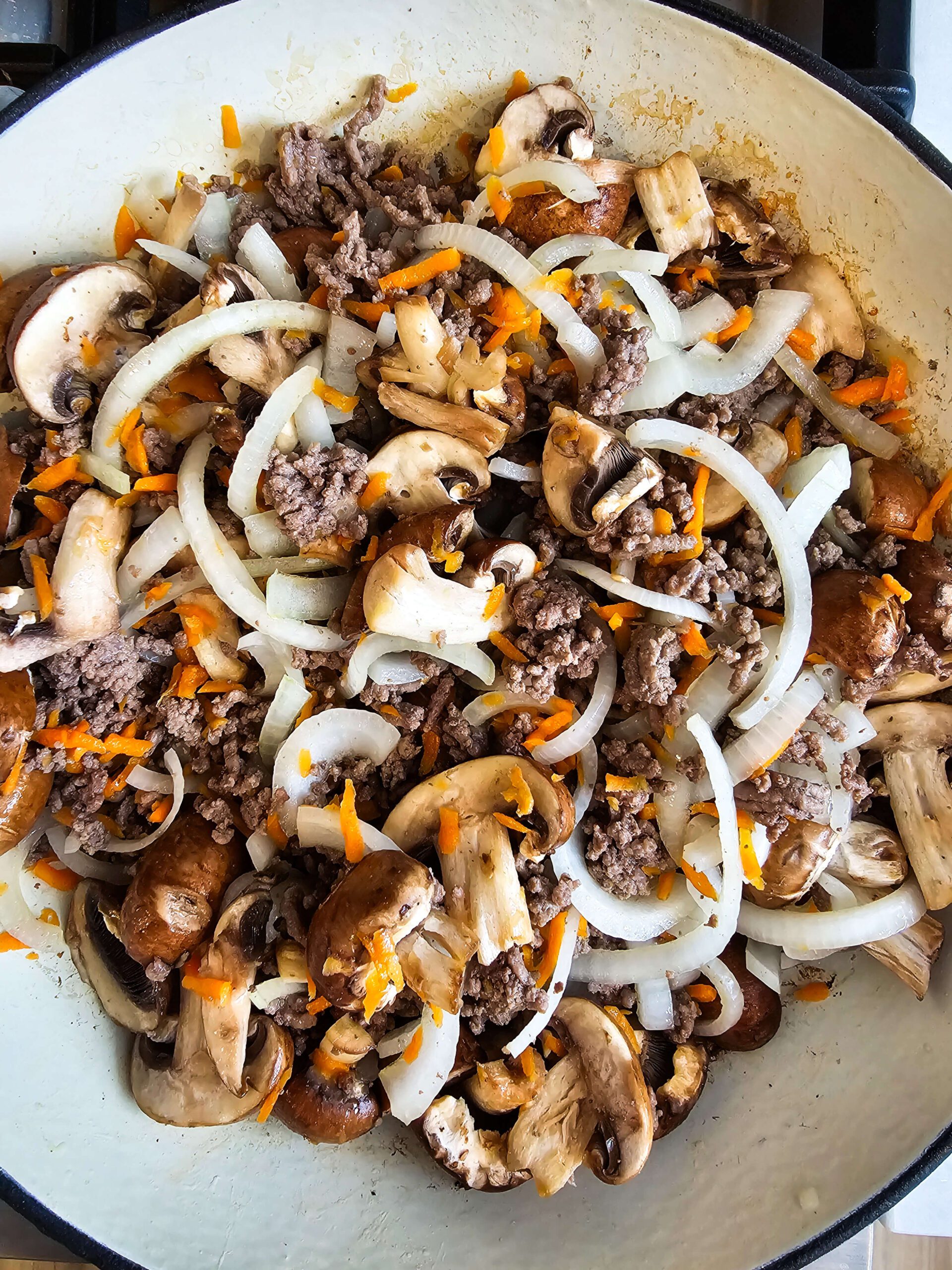 ADD ALL THE VEGGIES EXCEPT THE ZUCCHINI TO THE SKILLET TO SOFTEN