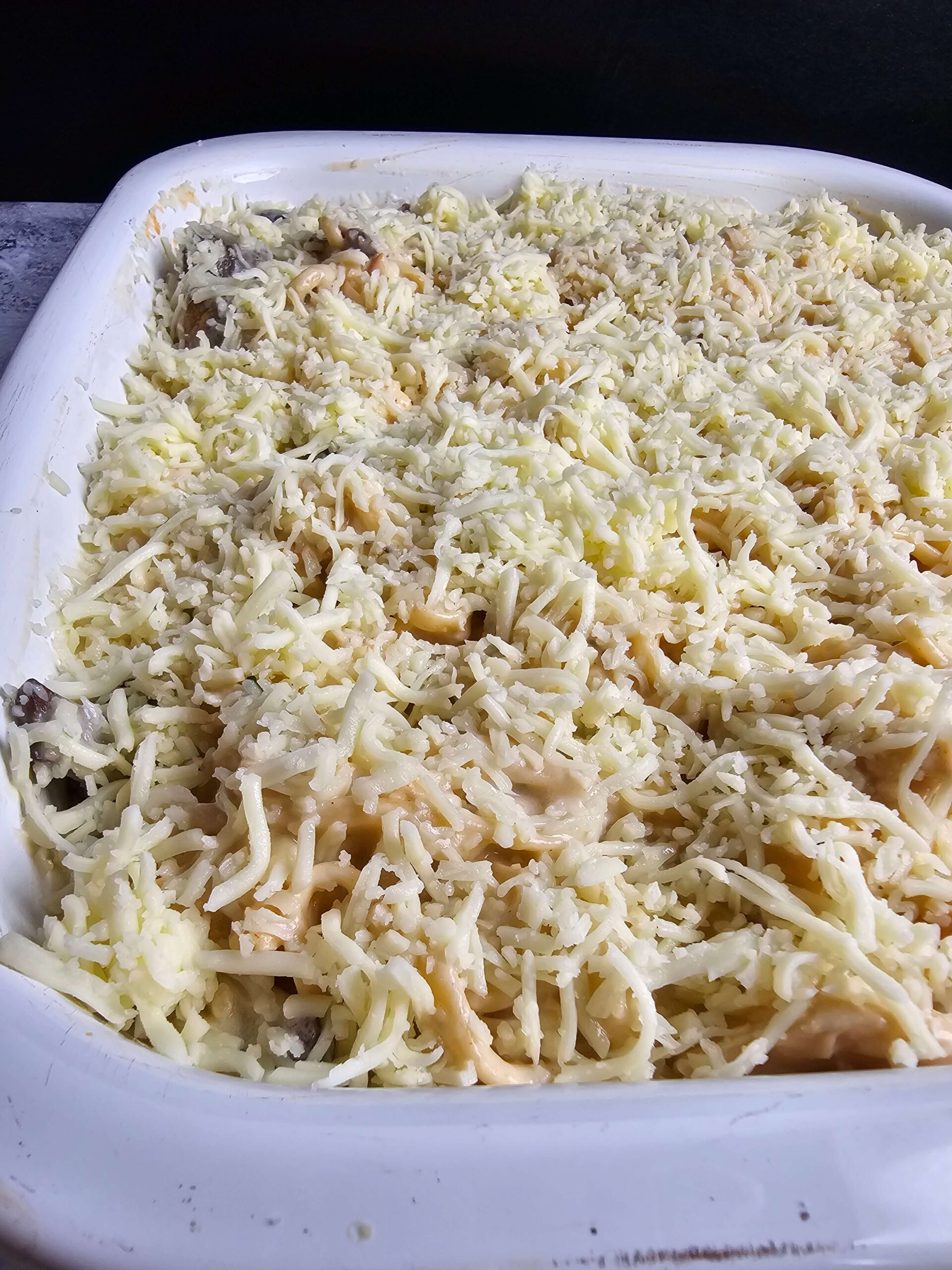 COMBINE PASTA, CREAMY SAUCE AND SHREDDED CHICKEN TOPPED WITH ONE CUP MOZZARELLA CHEESE