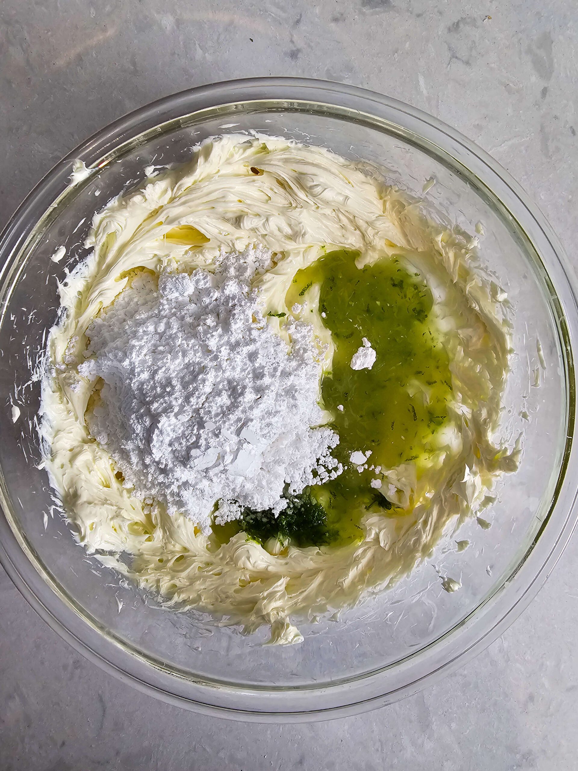 WHIP THE CREAM CHEESE, LIME JUICE, LIME ZEST AND POWDERED SUGAR TOGETHER
