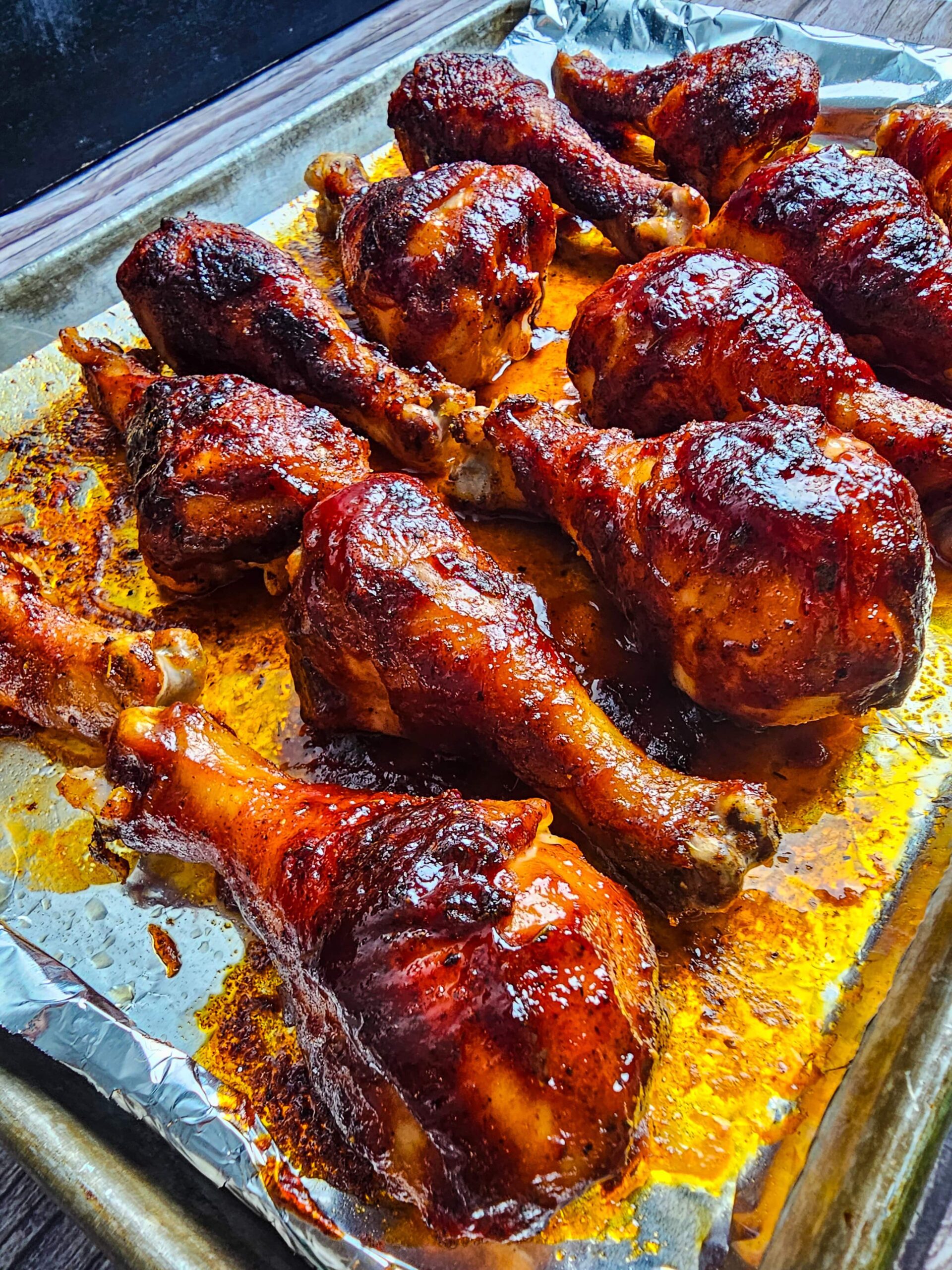 BRUSH THE BBQ SAUCE ALL OVER THE CHICKEN LEGS