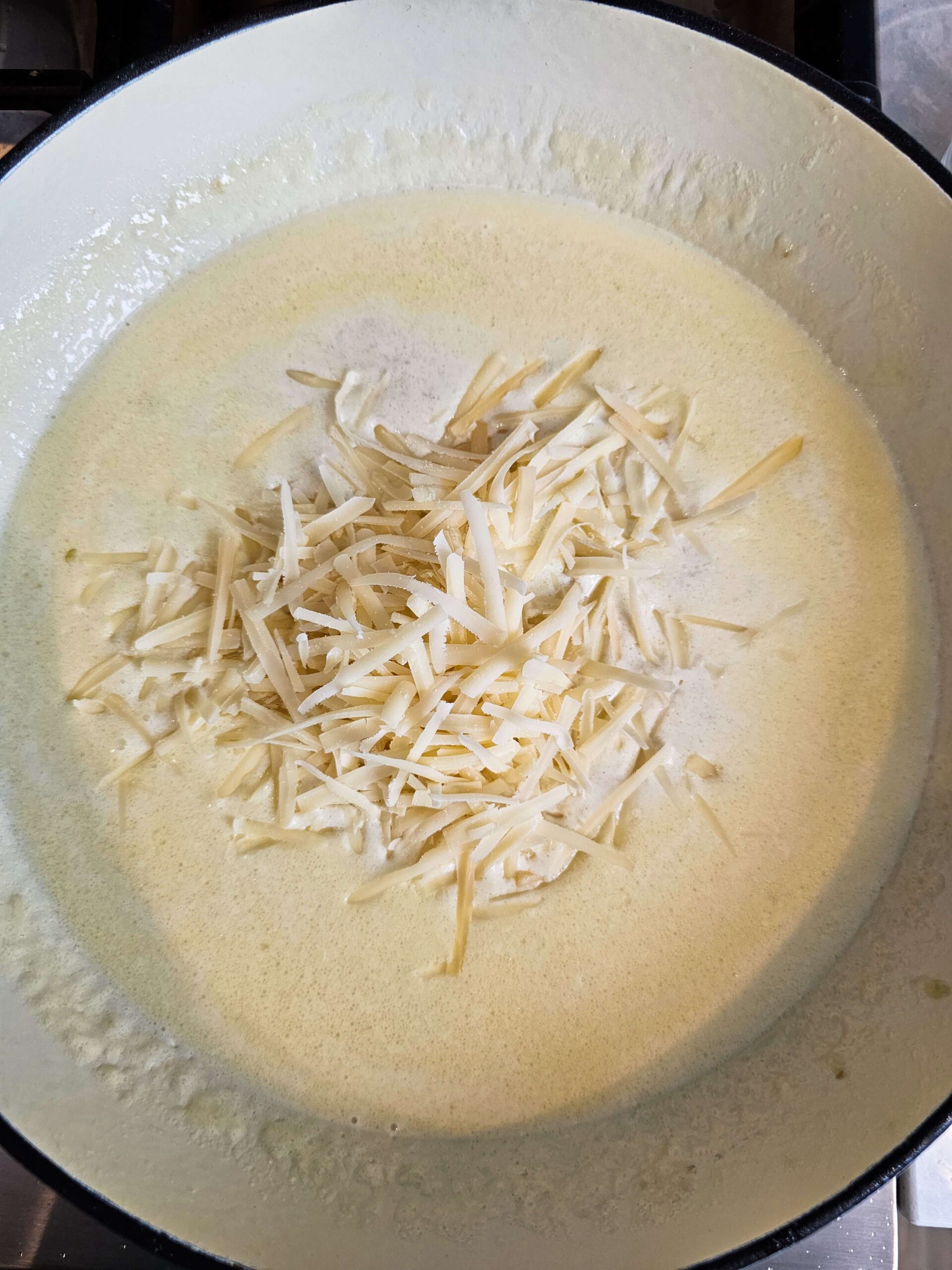 ADD ALL THE CREAMY PARMESAN SAUCE INGREDIENTS TO THE SAME SKILLET