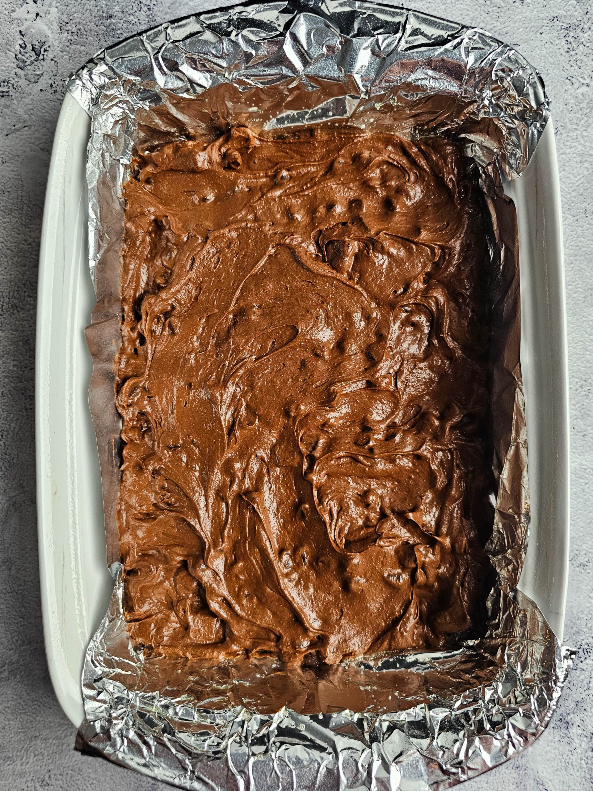 9X13 BAKING DISH AND SPREAD THE BROWNIE BATTER